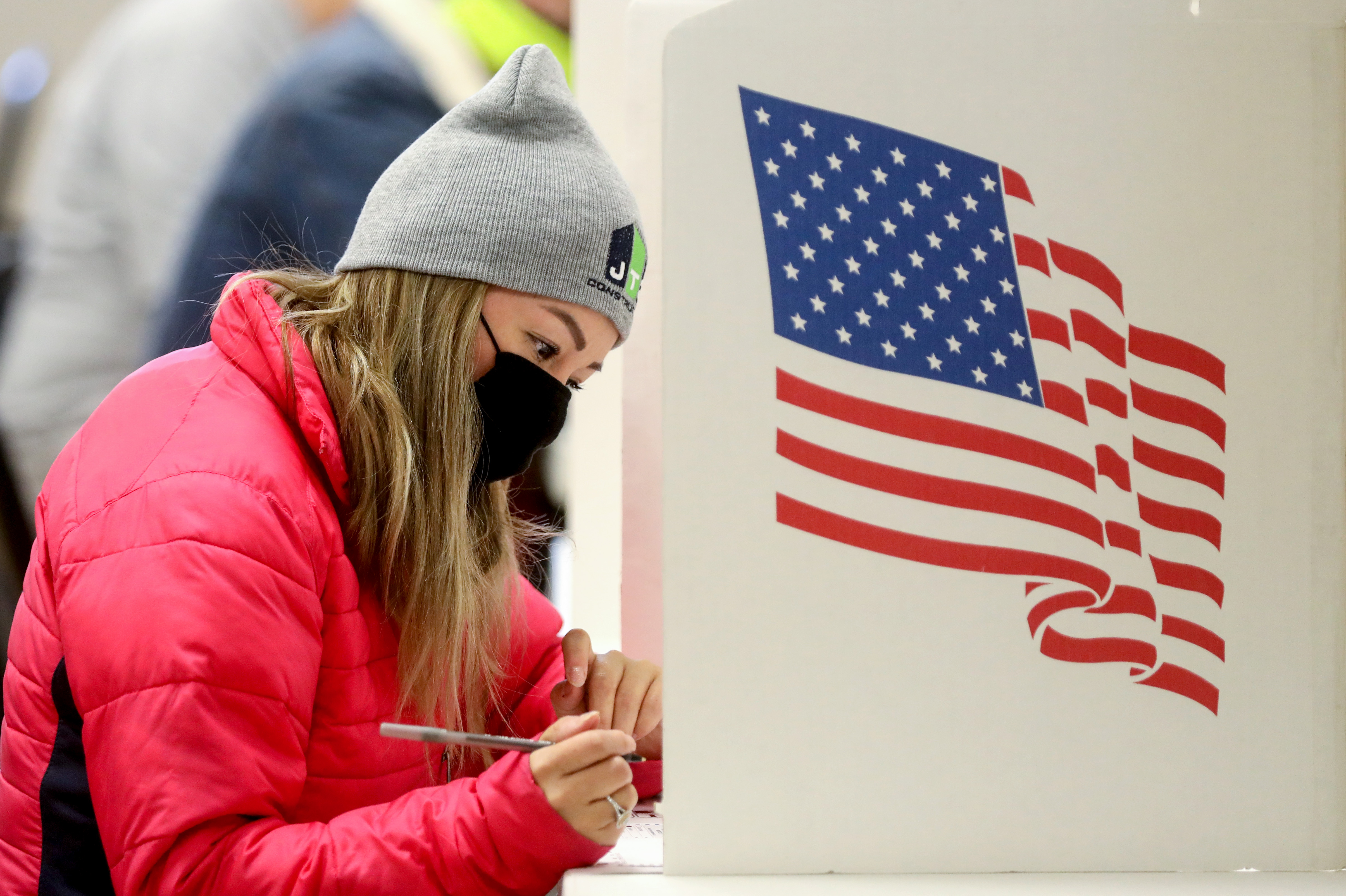 DES MOINES, IOWA - NOVEMBER 03: Voters mark their ballots at Bloomfield United Methodist Church on November 3, 2020 in Des Moines, Iowa. After a record-breaking early voting turnout, Americans head to the polls on Election Day to cast their vote for incumbent U.S. President Donald Trump or Democratic nominee Joe Biden in the 2020 presidential election. Mario Tama/Getty Images/AFP