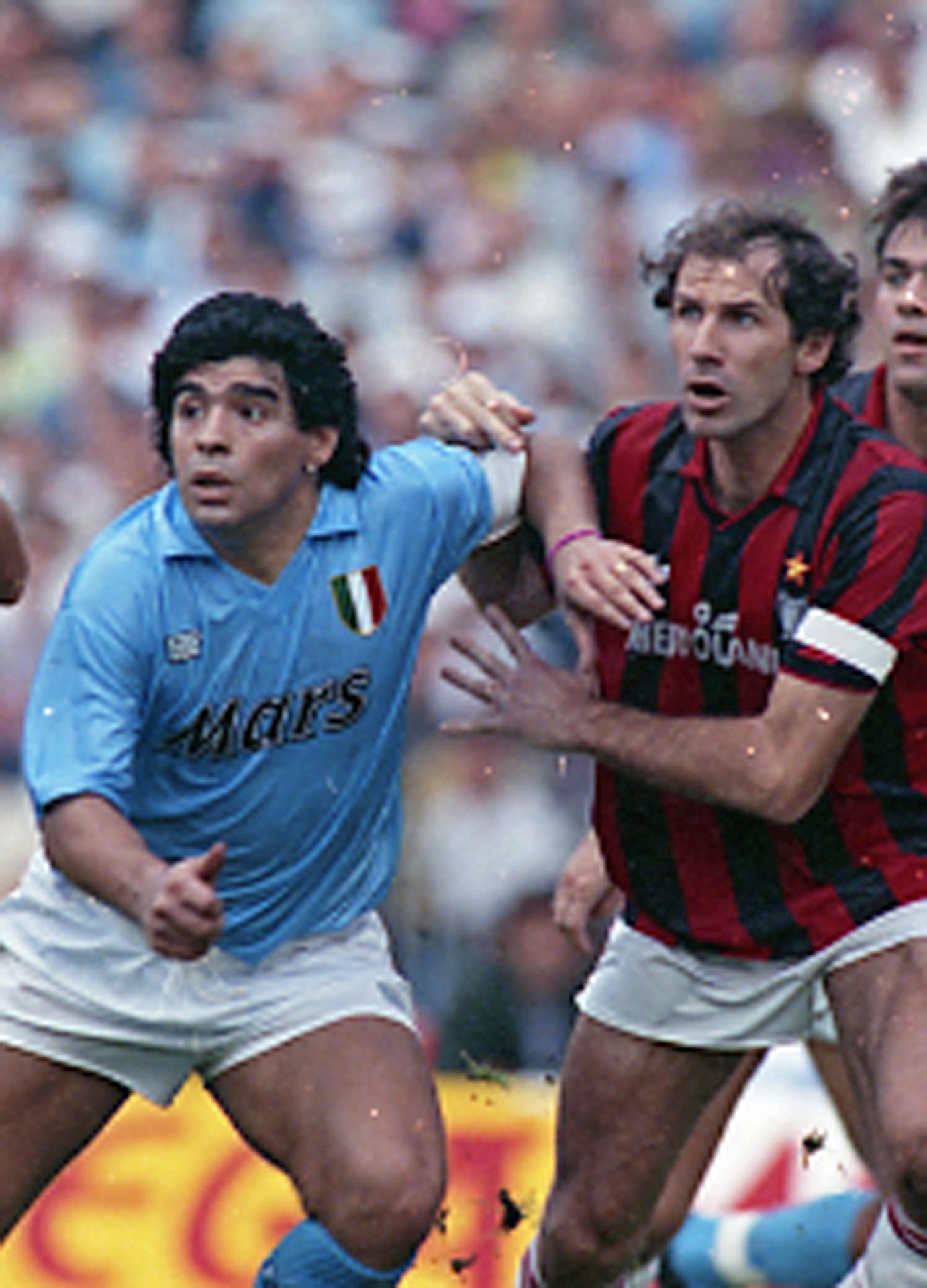 NAPLES (Italy), 31/07/2026.- (FILE) - Diego Maradona (L) of Napoli in action against Franco Baresi of AC Milan during the Italian Serie A match between Napoli and AC Milan in Naples, Italy, 21 October 1990 (re-issued 31 July 2026). Franco Baresi died at the age of 66, his former club AC Milan announced on 31 July 2026. (Italia, Nápoles) EFE/EPA/ANSA
