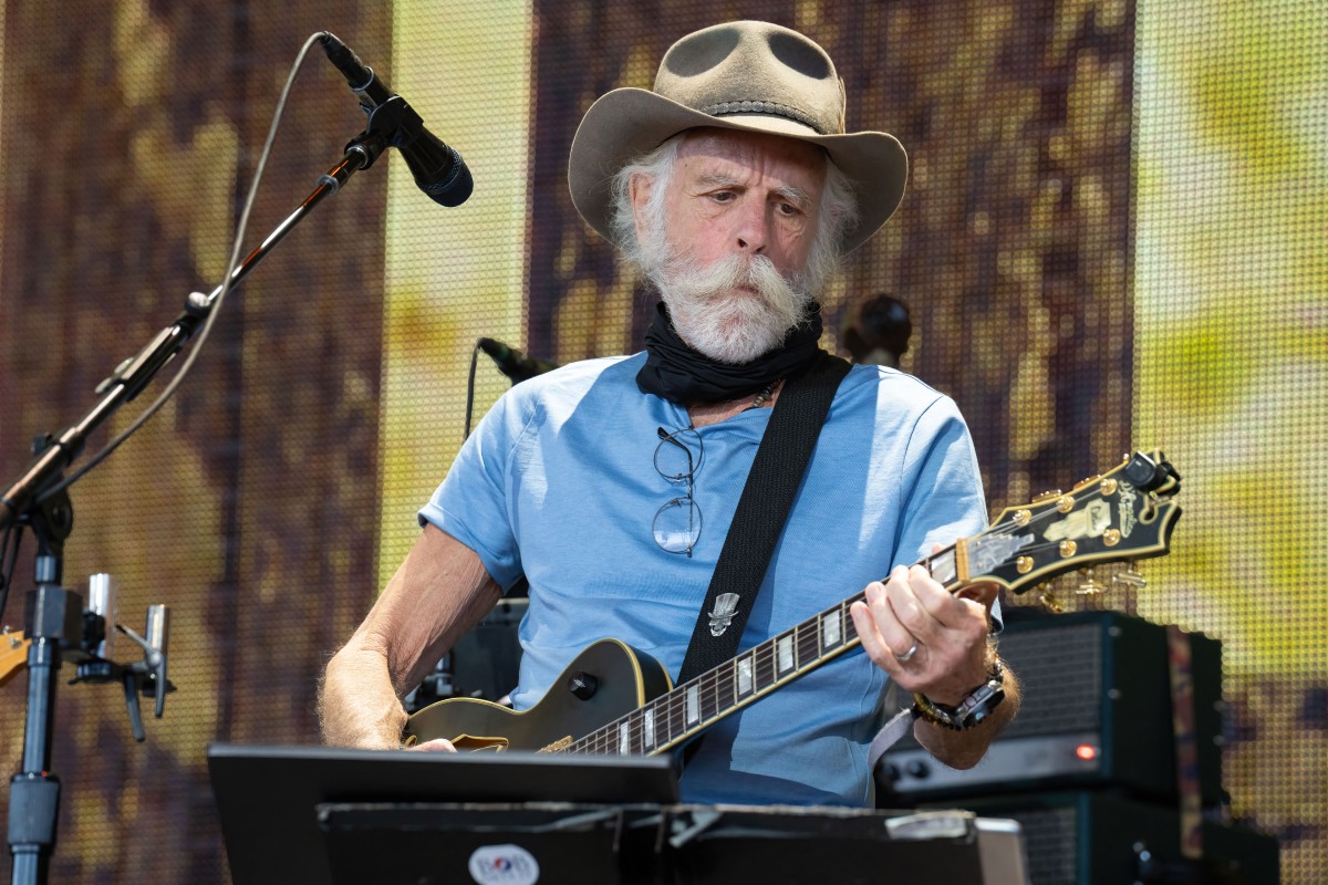 (FILES) US musician Bob Weir performs onstage during the Farm Aid Music Festival at the Ruoff Music Center in Noblesville, Indiana on September 24, 2023. US musician Bob Weir, a founding member of the band "Grateful Dead", has died at the age of 78, according to a statement posted to his official website and social media on January 10, 2026. Weir "succumbed to underlying lung issues" after being diagnosed with cancer in July, the statement said. (Photo by SUZANNE CORDEIRO / AFP)