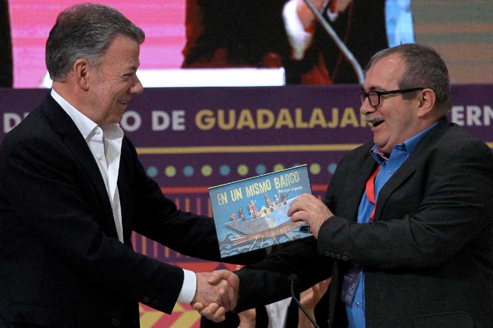 Juan Manuel Santos y Rodrigo Londoño.