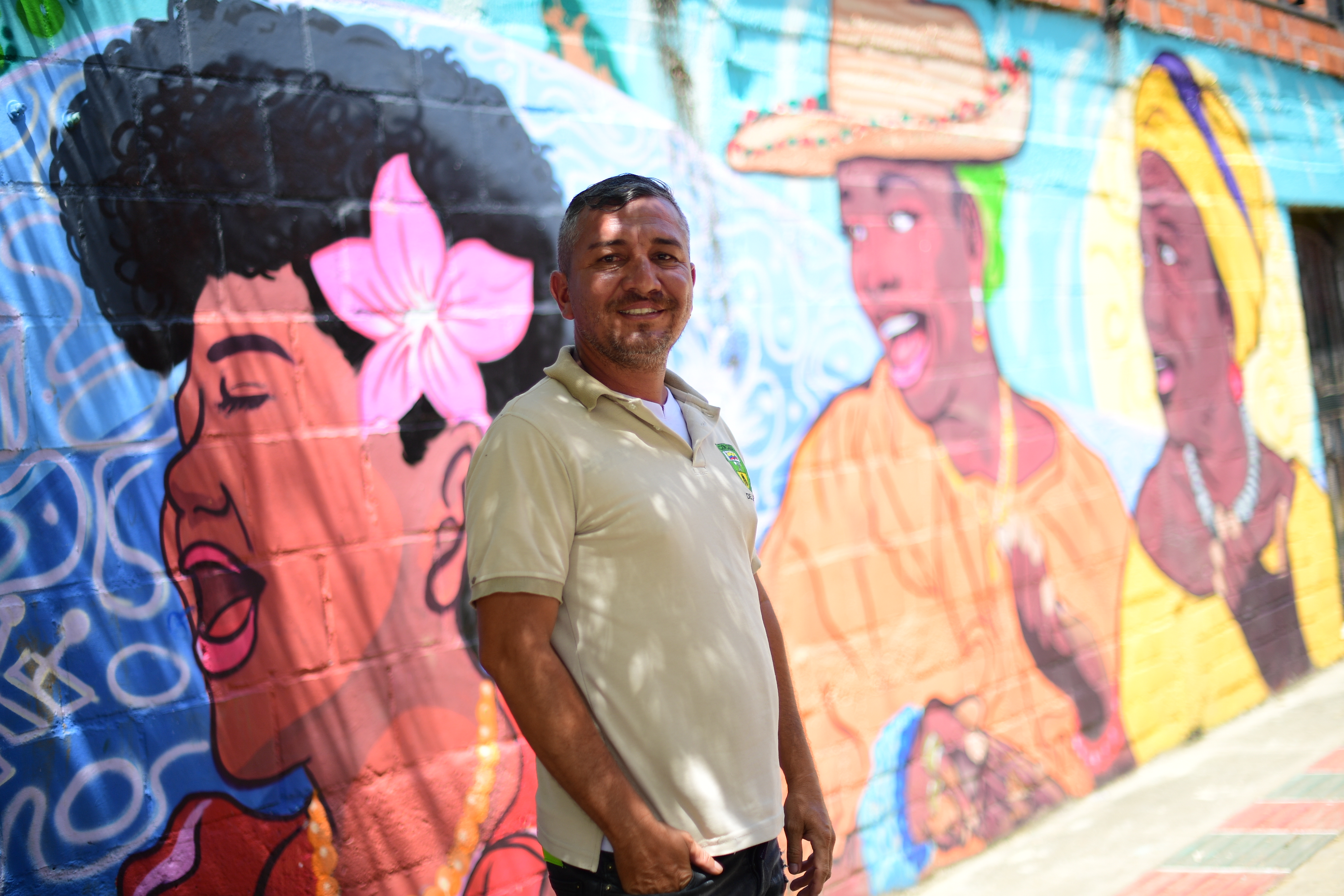 Jesús Santiago Patiño, reciclador de oficio y líder en la Junta de Acción Comunal de Llano Verde, explica que la comunidad acoge a víctimas del conflicto, desplazados, refugiados y migrantes.