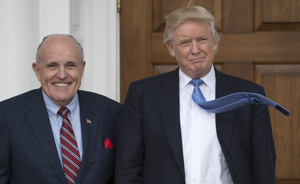 Rudy Giuliani (i) y Donald Trump (d) durante un evento en la Casa Blanca en 2016. / AFP