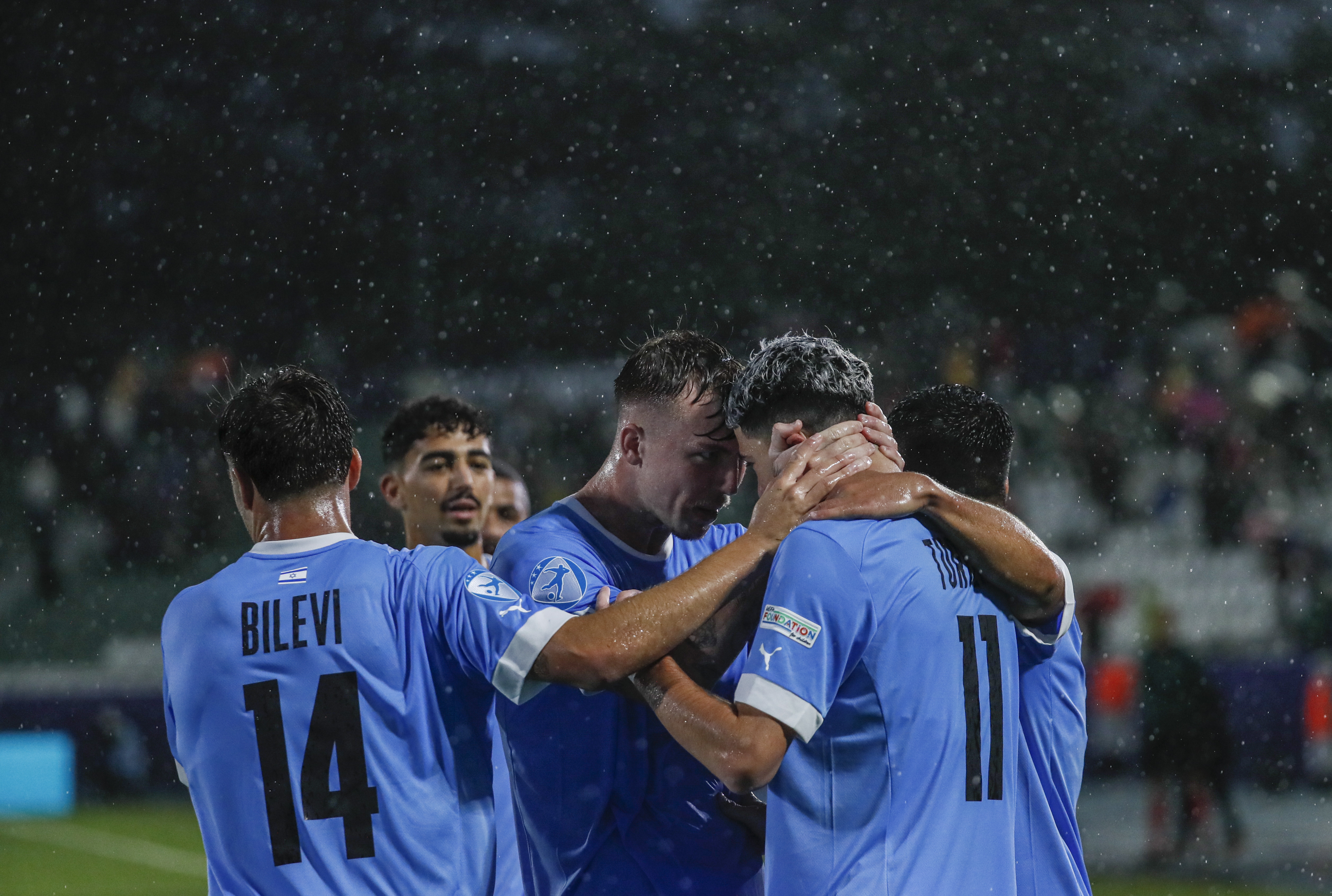 Kutaisi (Georgia), 22/06/2023.- Dor Turgeman (R) of Israel celebrates with teammates after scoring the 0-1 goal during the UEFA Under-21 Championship group stage match between Germany and Israel in Kutaisi, Georgia, 22 June 2023. (Alemania) EFE/EPA/YURI KOCHETKOV