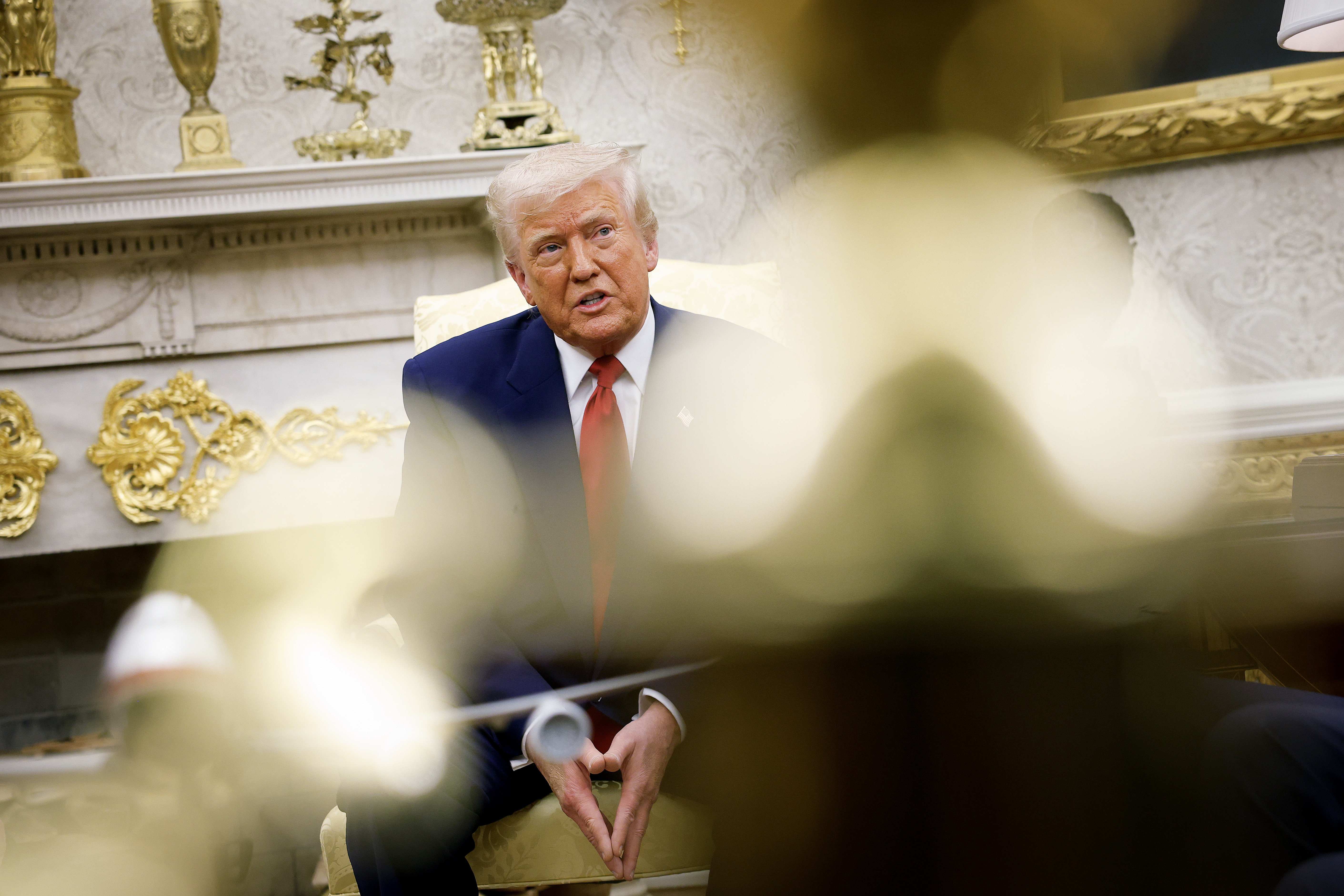 President Donald Trump speaks during a meeting in the Oval Office. Photographer: Kevin Dietsch/Getty Images North America