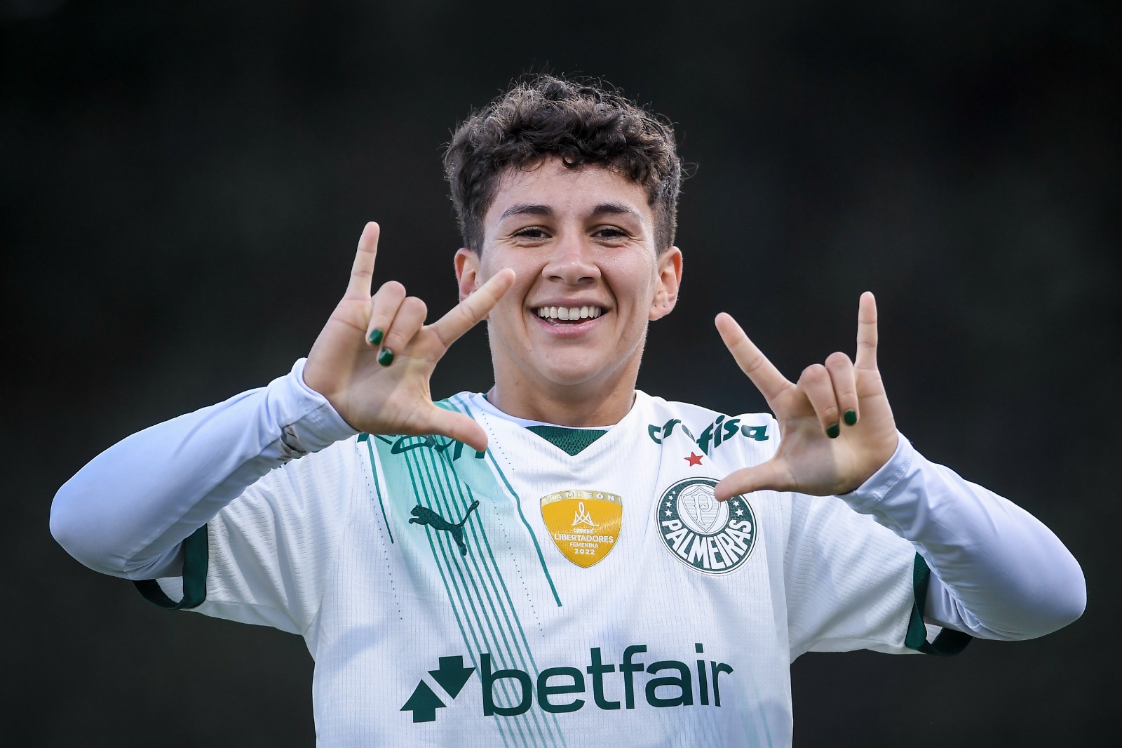 Jugadora de Palmeiras celebra el triunfo de su equipo ante Atlético Nacional en Copa Libertadores.