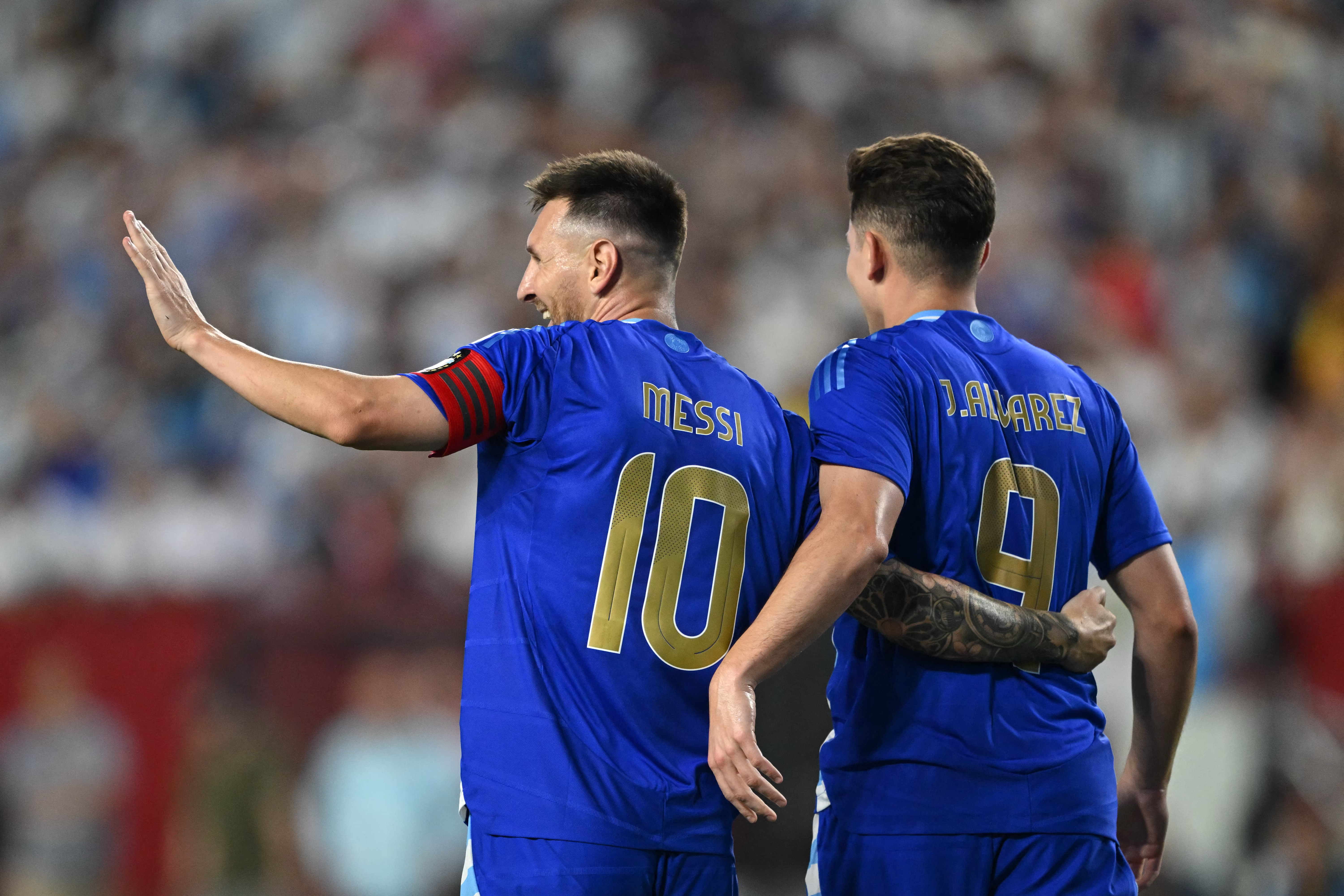 Argentina's forward #10 Lionel Messi and Argentina's forward #09 Julian Alvarez celebrate a goal during the international friendly football match between Guatemala and Argentina at Commanders Field in Greater Landover, Maryland, on June 14, 2024.