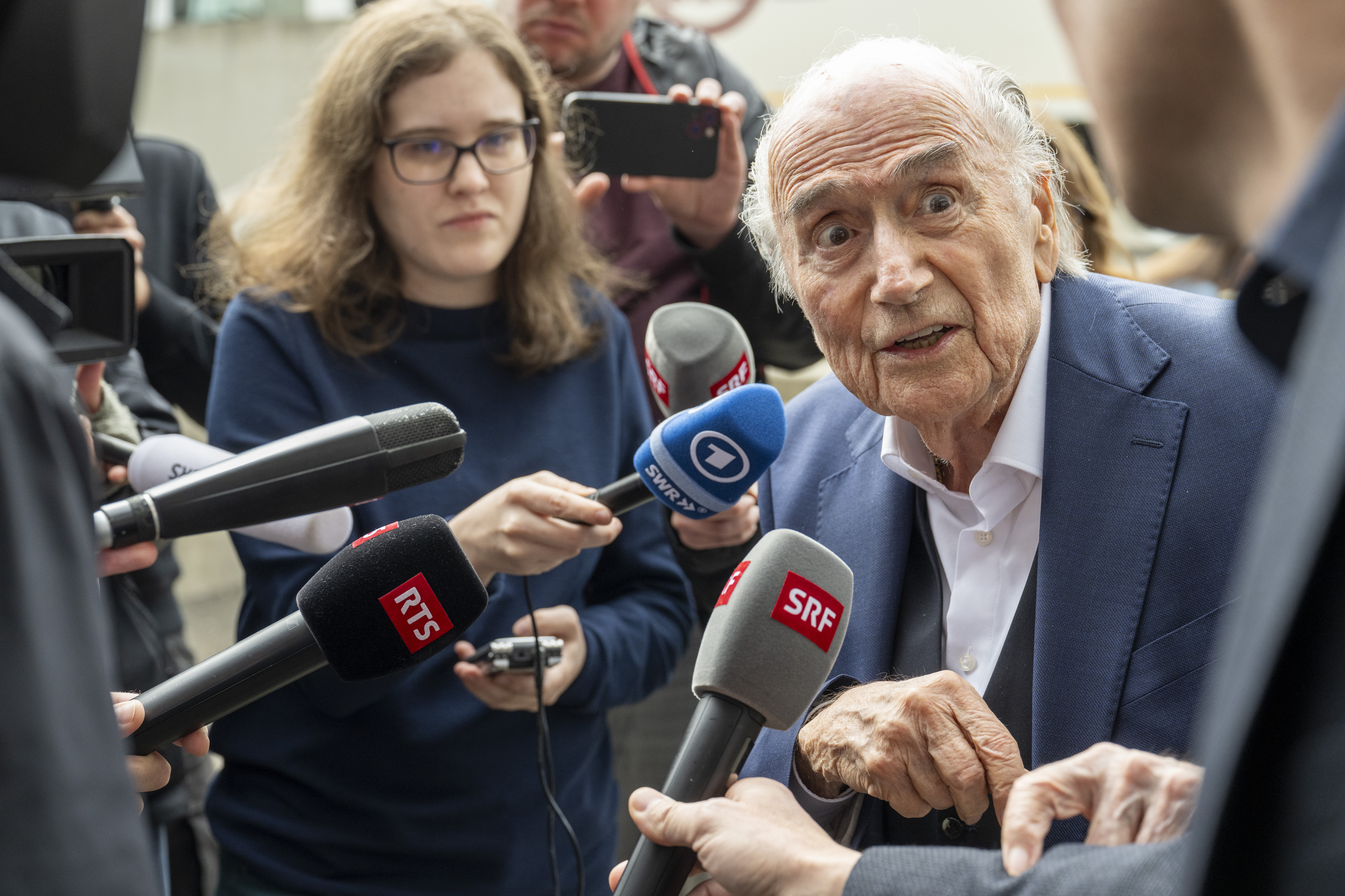 Muttenz (Switzerland), 25/03/2025.- Former FIFA President, Joseph (Sepp) Blatter (R) speaks to journalists after the verdict at the special appeals court, in Muttenz, Switzerland, 25 March 2025. A special appeals court, sitting in Muttenz near Basel, cleared both Michel Platini and Joseph (Sepp) Blatter of corruption charges. (Suiza, Basilea) EFE/EPA/URS FLUEELER