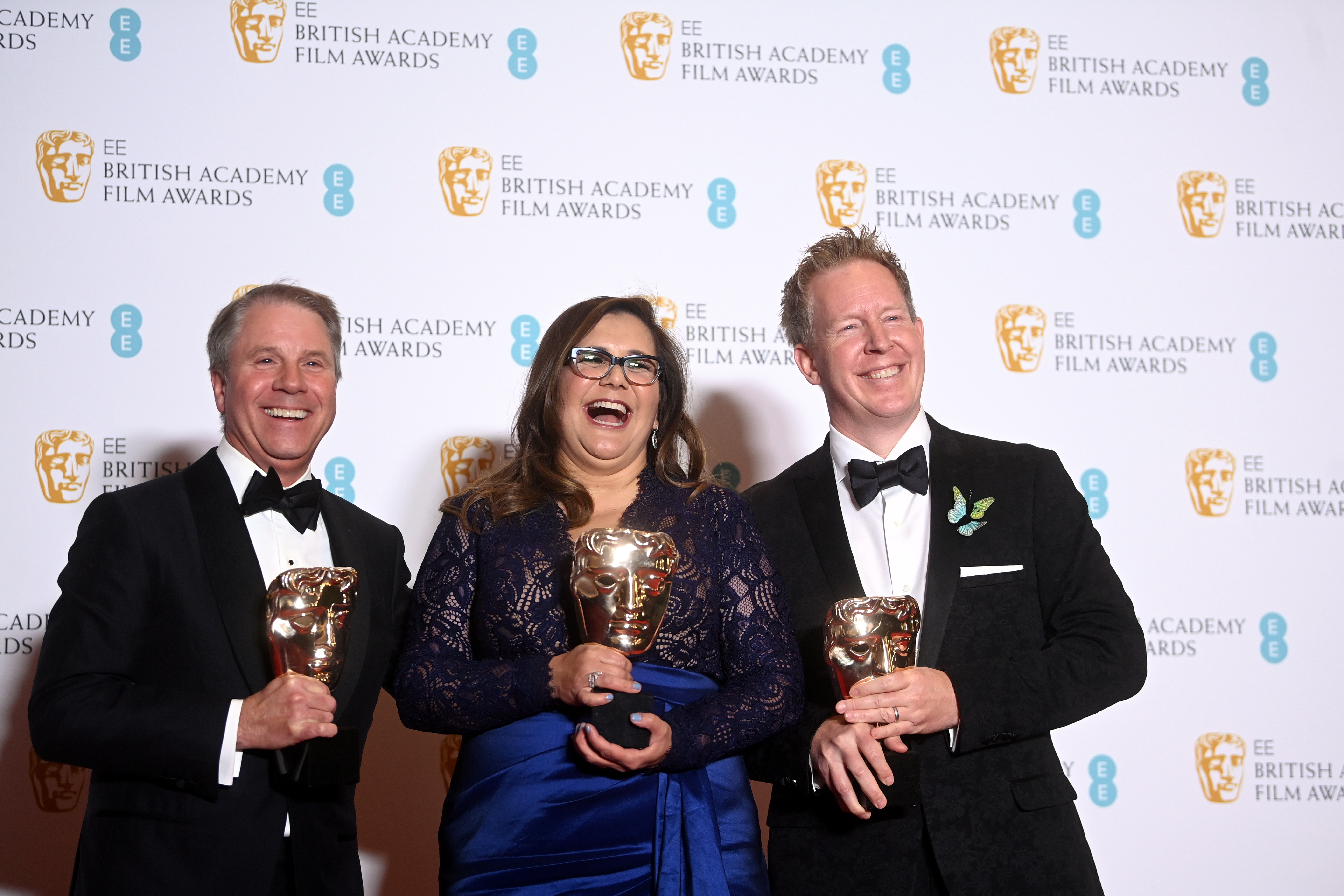 London (United Kingdom), 13/03/2022.- Clark Spencer (L), Yvett Merino (C) and Jared Bush (R), winners of the Animated Film Award for the film Encanto, pose in the press room during the 75th BAFTA Film Awards at the Royal Albert Hall in London, Britain, 13 March 2022. The ceremony is hosted by the British Academy of Film and Television Arts (BAFTA). (Reino Unido, Londres) EFE/EPA/NEIL HALL *** Local Caption *** 55844832