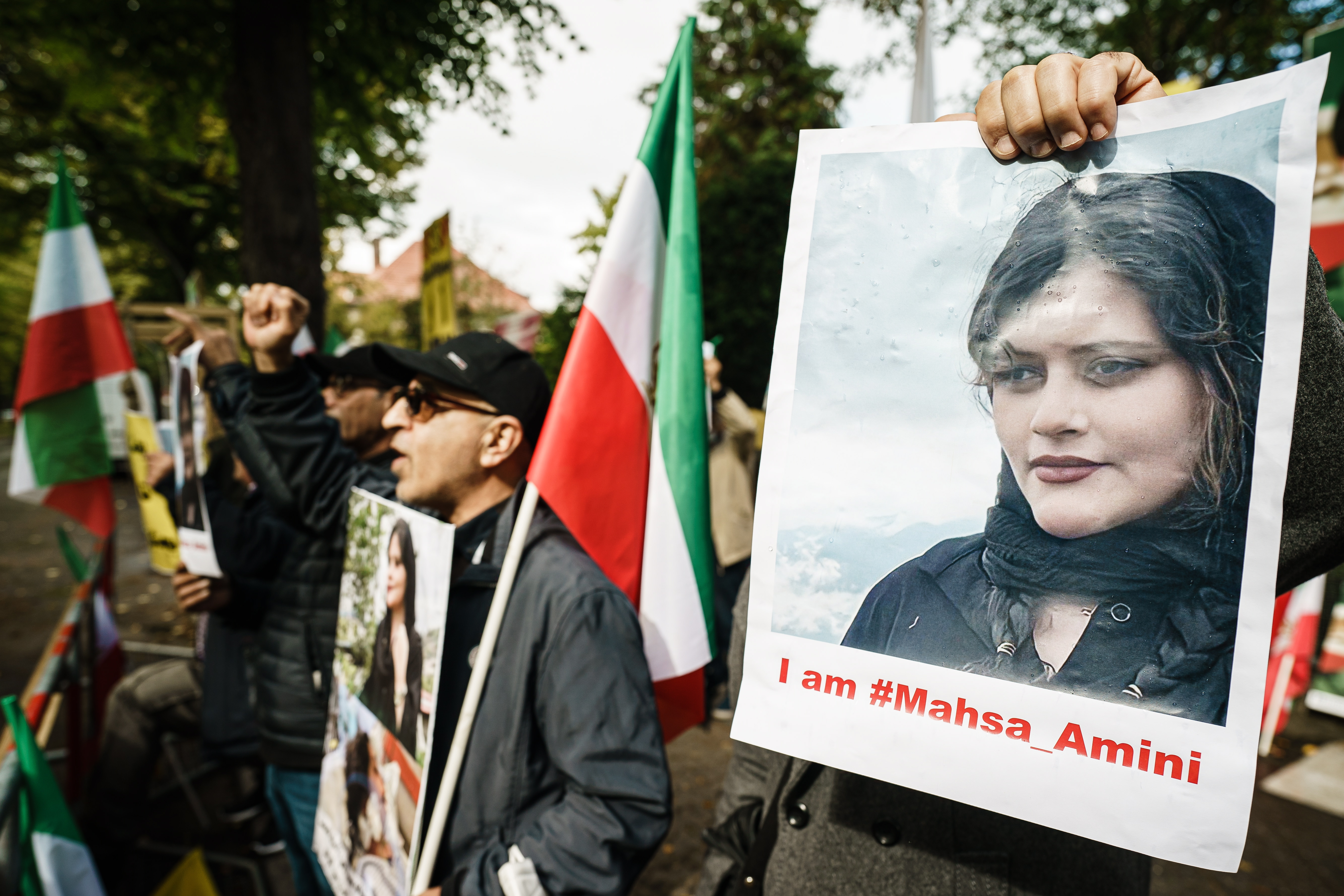 Berlin (Germany), 20/09/2022.- Protesters of the National Council of Resistance of Iran (NWRI) demonstrate with placards showing deceased Mahsa Amini, in front of the Embassy of the Islamic Republic of Iran in Berlin, Germany, 20 September 2022. Mahsa Amini, a 22 year old Iranian girl, who was arrested by the police unit responsible for enforcing Iran's strict dress code for women, she was detained on 13 September by the Iran's police and was declared dead on 16 September, after she spent 3 days in a coma. (Protestas, Alemania) EFE/EPA/CLEMENS BILAN