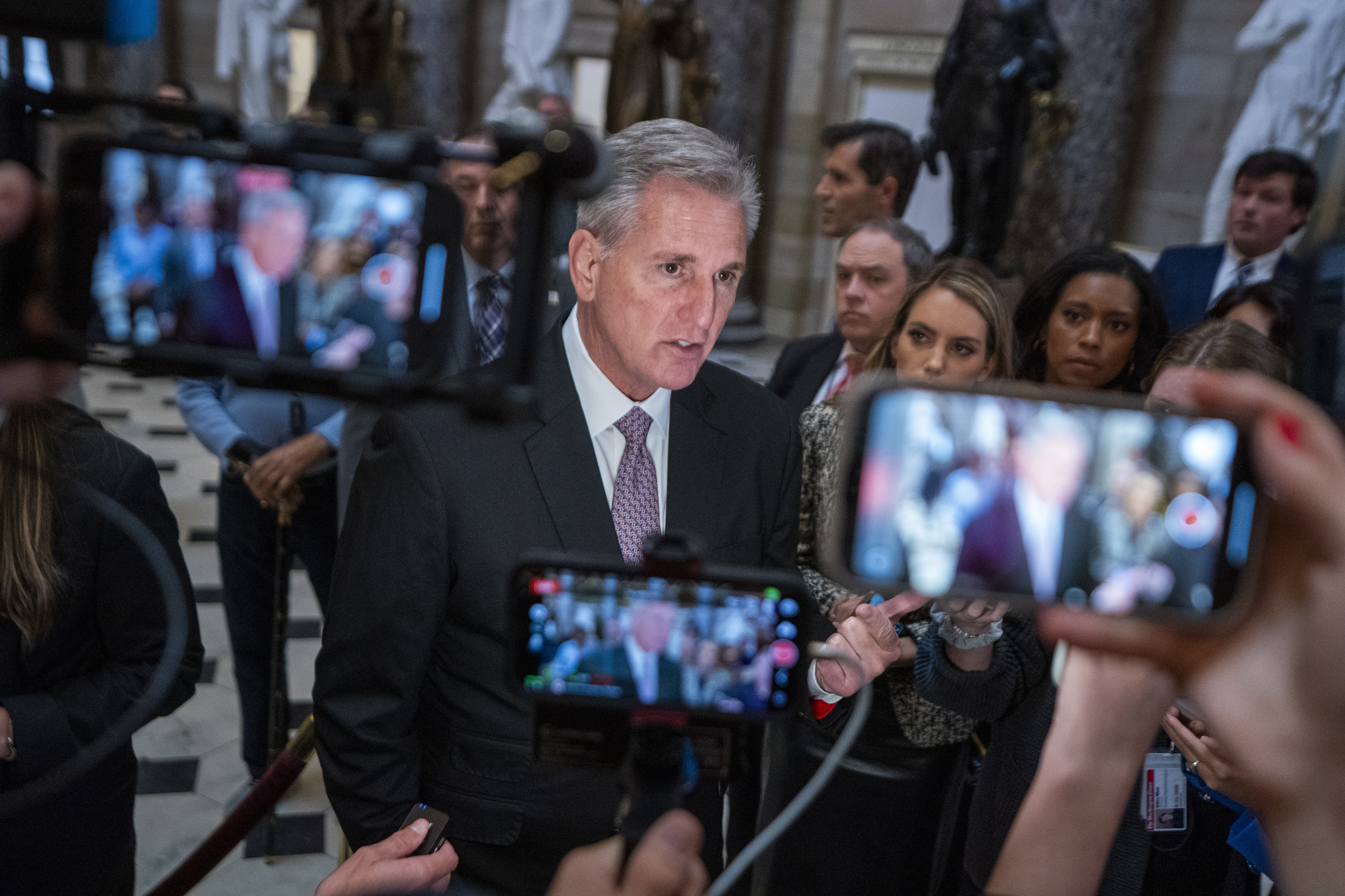 Washington (United States), 02/10/2023.- Speaker of the House Kevin McCarthy responds to a question from the news media as he walks to the House floor in the US Capitol in Washington, DC, USA, 02 October 2023. Earlier in the day, Republican Representative from Florida Matt Gaetz used a floor speech to threaten the use of a motion to vacate to try and strip Speaker of the House McCarthy of his speakership. EFE/EPA/SHAWN THEW