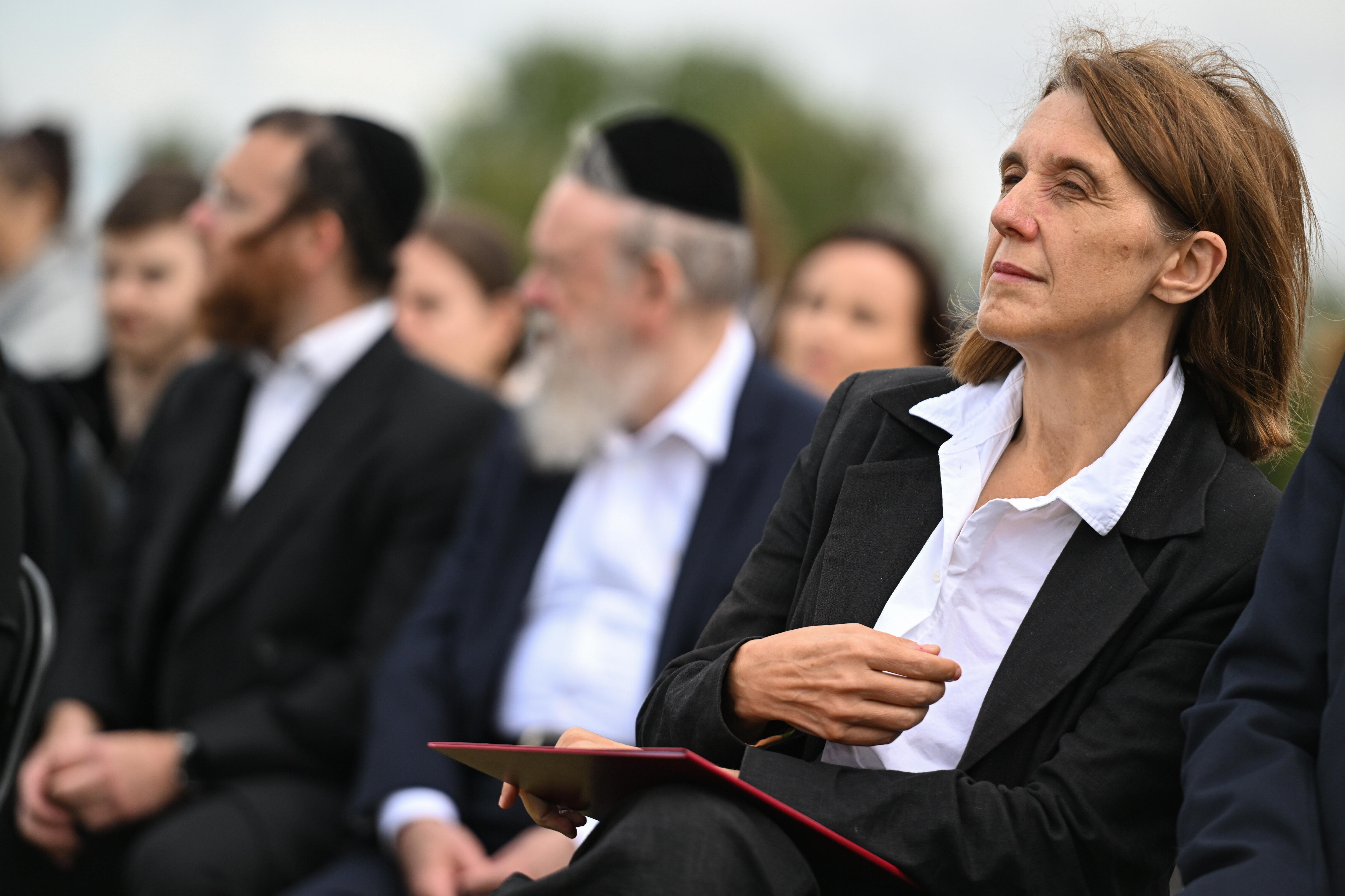 Lublin (Poland), 22/08/2024.- Polish Minister of Culture and National Heritage Hanna Wroblewska (R) attends the celebration of the 80th anniversary of the liquidation of the German Nazi extermination camp Majdanek in Lublin, eastern Poland, 22 August 2024. On 22 July 1944, about 800 people were escorted from Majdanek by SS officers. After a few days of march, they were embarked on a train to Auschwitz. (Polonia) EFE/EPA/WOJTEK JARGILO POLAND OUT