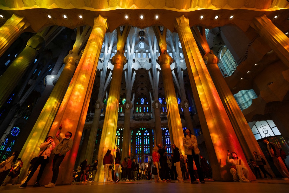 (FILES) Tourists visit Spanish architect Antoni Gaudi's Sagrada Familia Basilica in Barcelona on February 3, 2026.