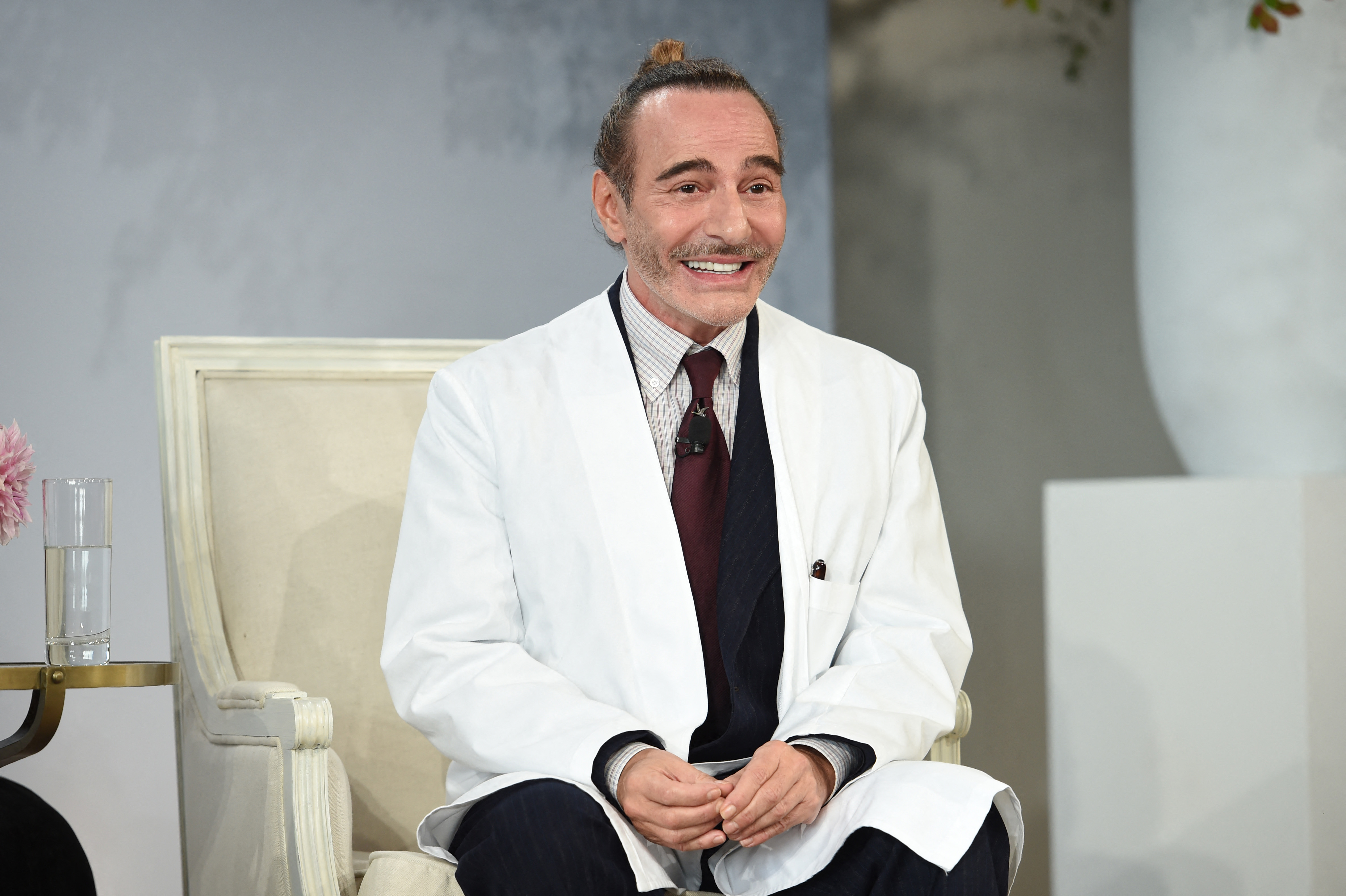 (FILES) British fashion designer John Galliano attends Vogue's Forces of Fashion Conference at Milk Studios in New York City, on October 12, 2017.