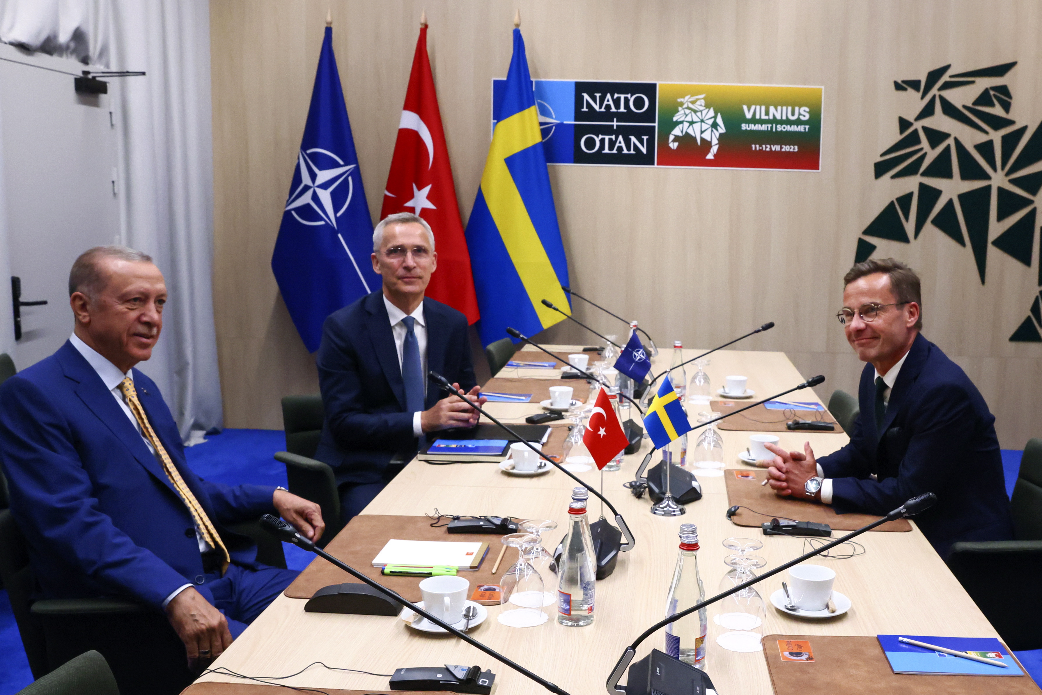 Vilnius (Lithuania), 10/07/2023.- NATO Secretary-General Jens Stoltenberg (C), Turkish President Tayyip Erdogan (L) and Swedish Prime Minister Ulf Kristersson (R) attend a meeting, on the eve of a NATO summit, in Vilnius, Lithuania, 10 July 2023. The NATO Summit will take place in Vilnius on 11 and 12 July 2023 with the alliance's leaders expected to adopt new defense plans. (Lituania, Suecia, Turquía) EFE/EPA/YVES HERMAN / POOL