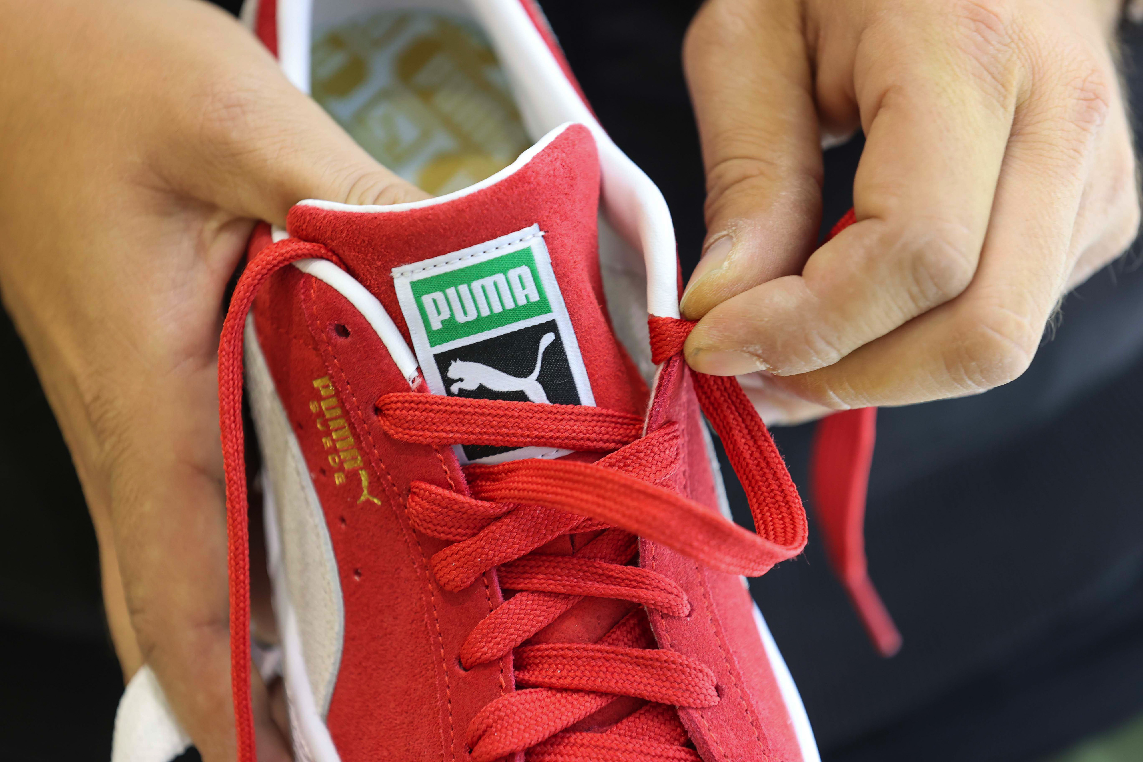 Familia Pinault evalúa posible venta para marca deportiva Puma