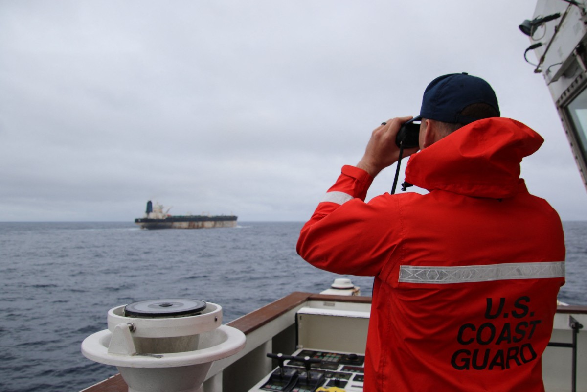 TOPSHOT - This undated handout photo released on January 7, 2026, by the US European Command's X account shows what US European Command says is the seizure of the M/V Bella 1 oil tanker in the northern Atlantic Ocean.