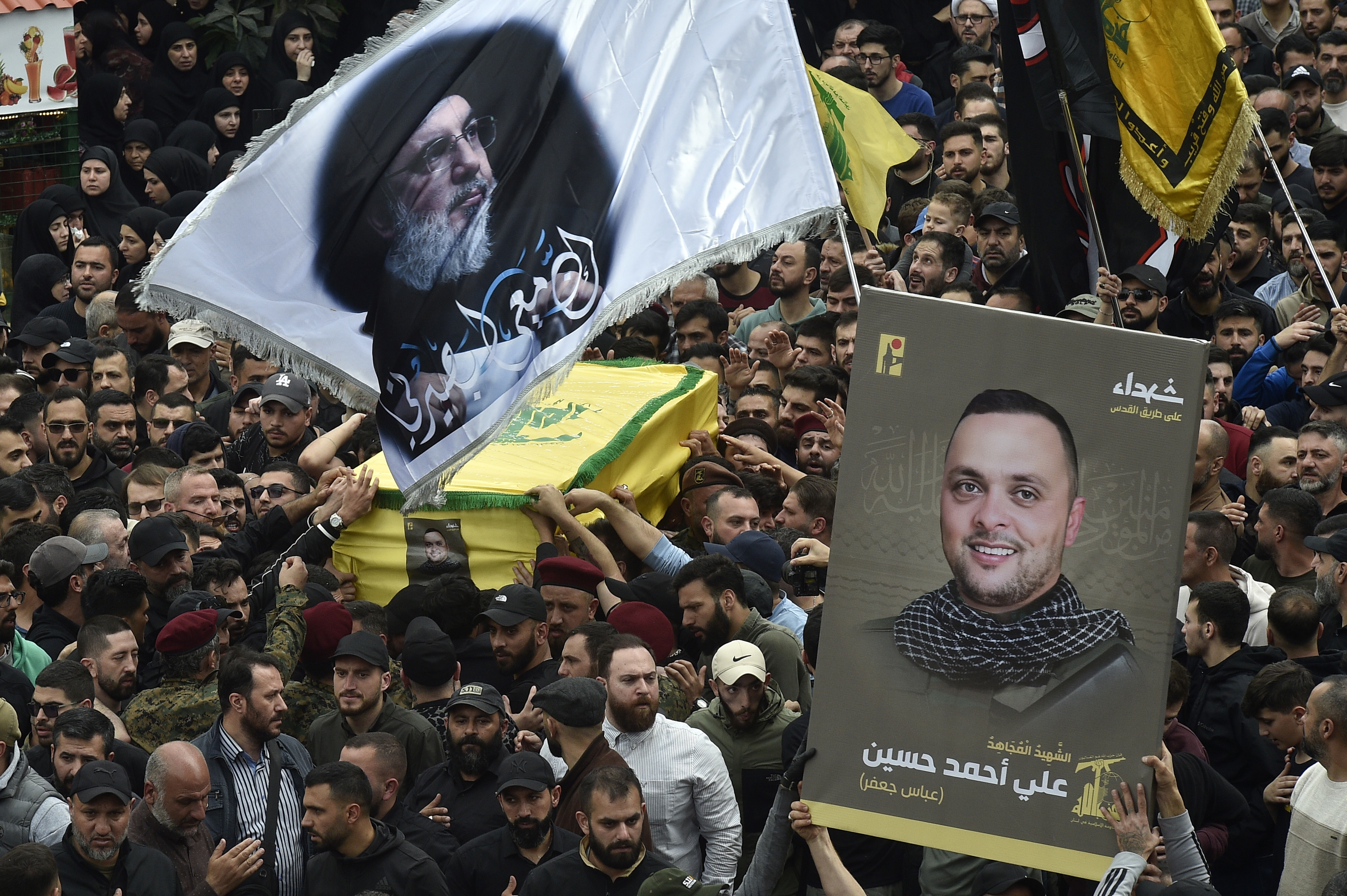 Beirut (Lebanon), 08/04/2024.- Mourners carry the coffin of late Hezbollah commander Ali Ahmed Hussein during a funeral procession in Beirut, Lebanon, 08 April 2024. The Israeli military announced that an airstrike by Israeli jets during the night had killed Hezbollah commander Ali Ahmed Hussein, along with two other Hezbollah members who were accompanying him in the Sultaniyeh region of southern Lebanon on 08 April. (Líbano, Hizbulá/Hezbolá) EFE/EPA/WAEL HAMZEH