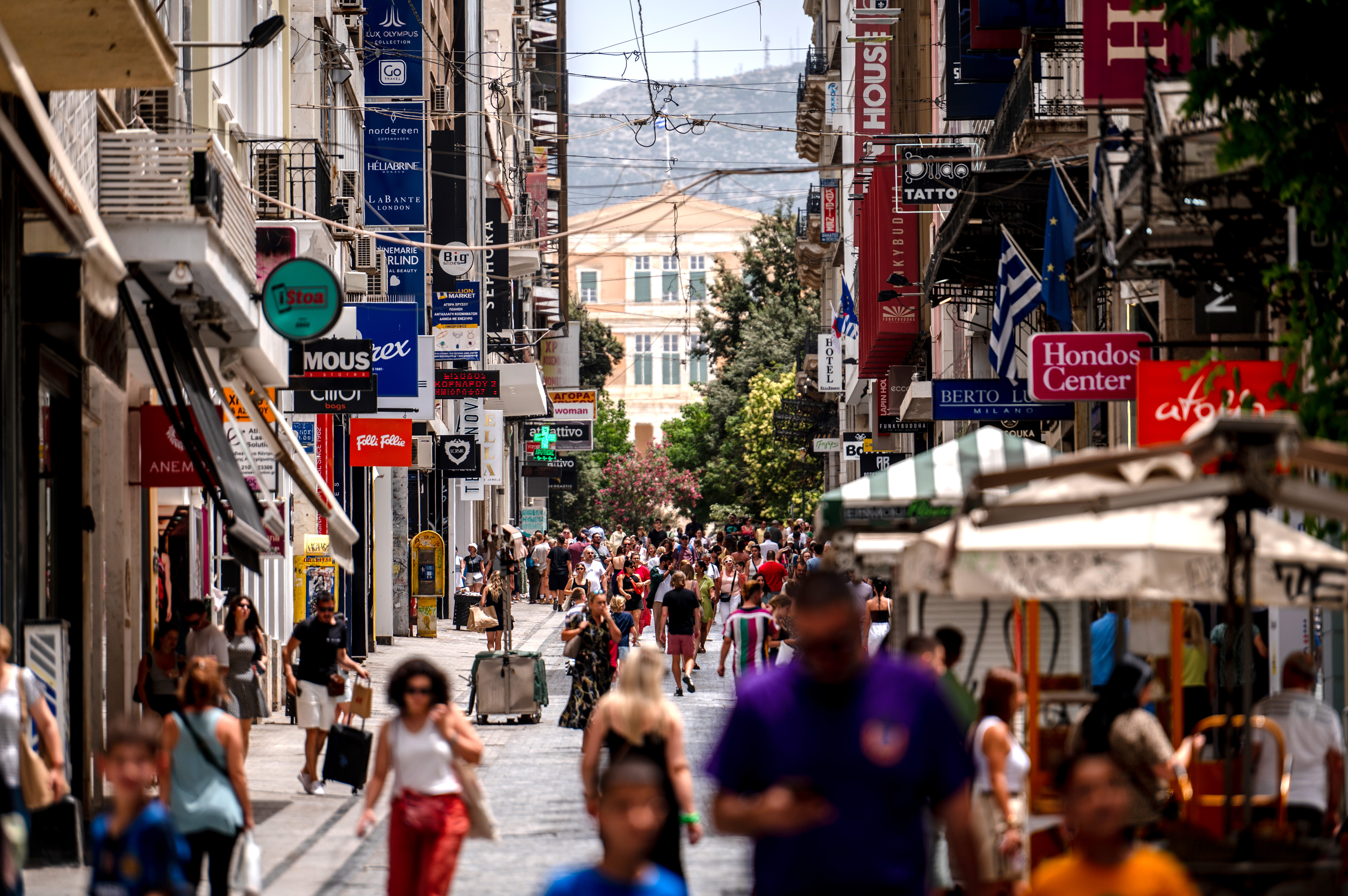 A busy shopping street in Athens. Photographer: Hilary Swift/Bloomberg
