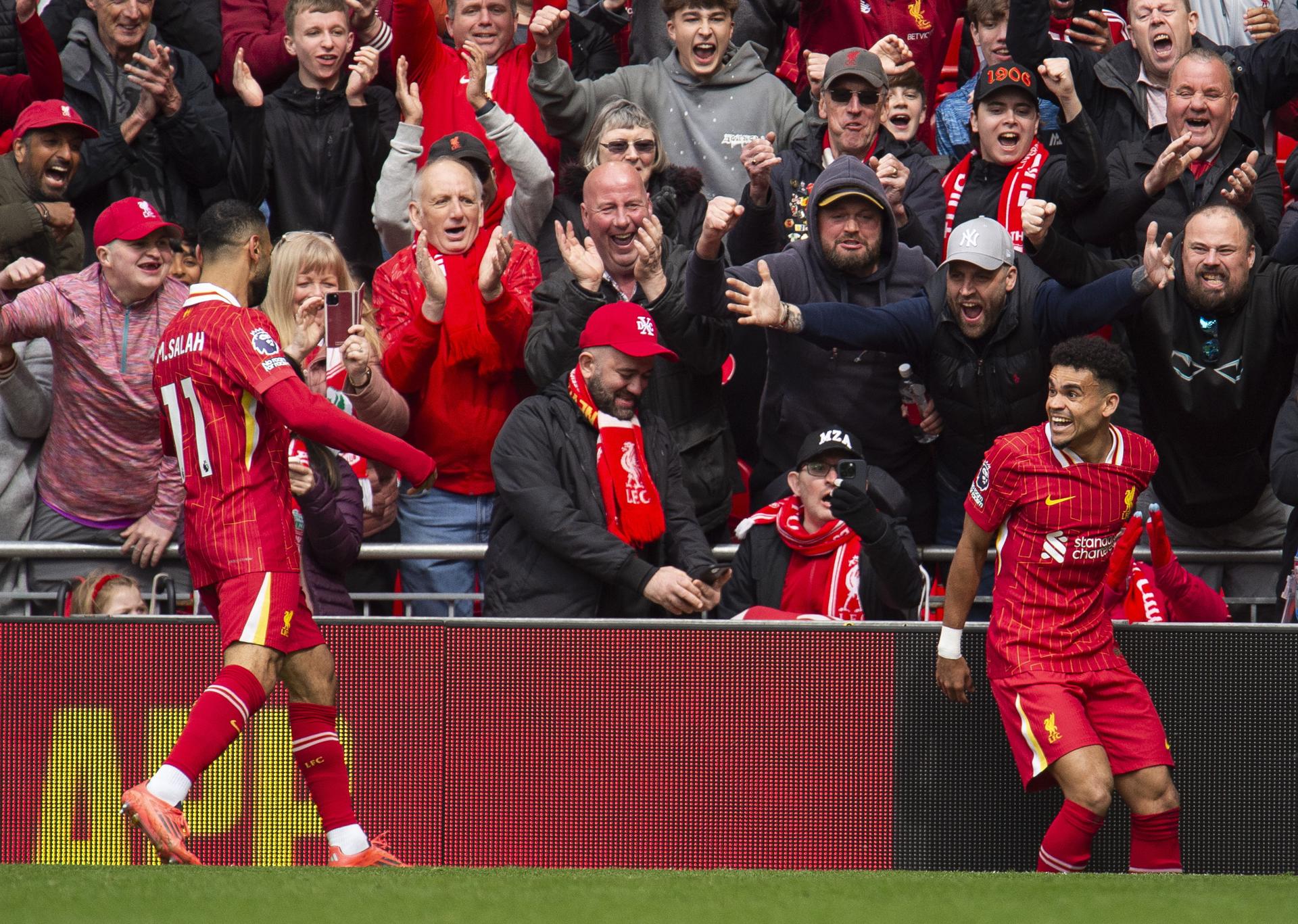 LIVERPOOL (United Kingdom), 13/04/2025.- Luis Diaz of Liverpool celebrates after scoring the opening goal with Mohamed Salah of Liverpool during the English Premier League soccer match between Liverpool FC and West Ham United, in Liverpool, Britain, 13 April 2025. (Reino Unido) EFE/EPA/PETER POWELL EDITORIAL USE ONLY. No use with unauthorized audio, video, data, fixture lists, club/league logos, 'live' services or NFTs. Online in-match use limited to 120 images, no video emulation. No use in betting, games or single club/league/player publications.