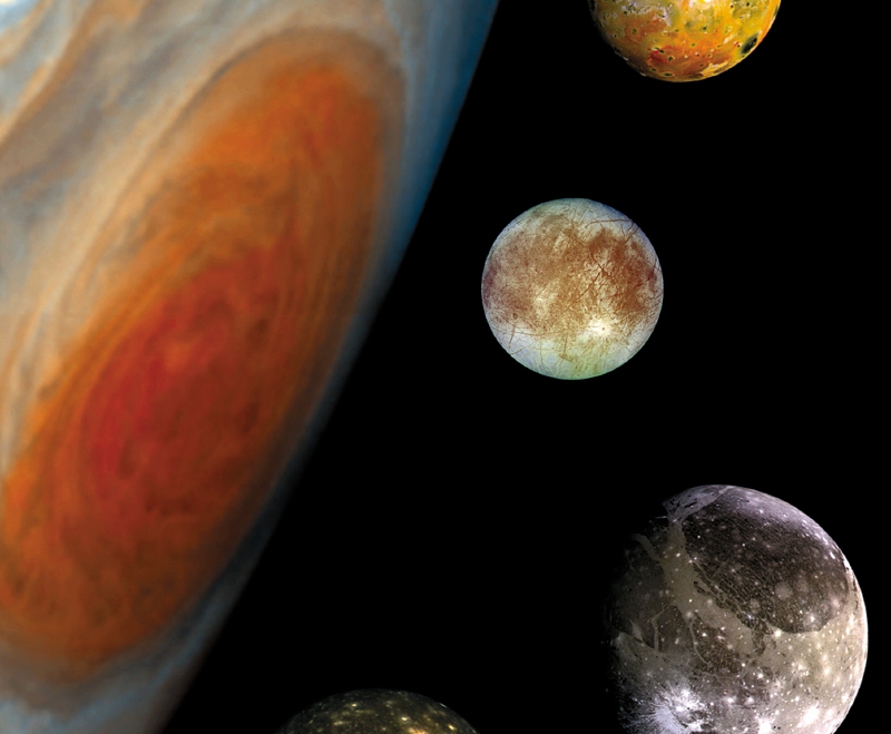 Júpiter junto a tres de sus lunas.
