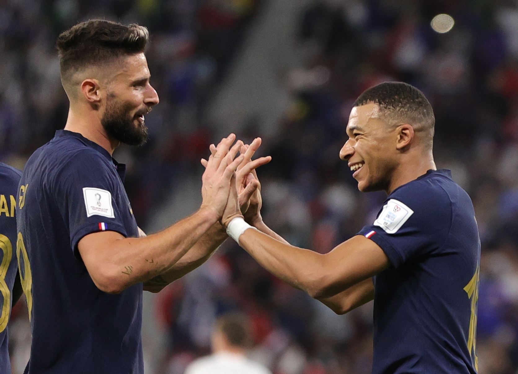 Doha (Qatar), 04/12/2022.- Kylian Mbappe (R) of France celebrates with teammate Olivier Giroud after scoring the 2-0 lead during the FIFA World Cup 2022 round of 16 soccer match between France and Poland at Al Thumama Stadium in Doha, Qatar, 04 December 2022. (Mundial de Fútbol, Francia, Polonia, Catar) EFE/EPA/Friedemann Vogel