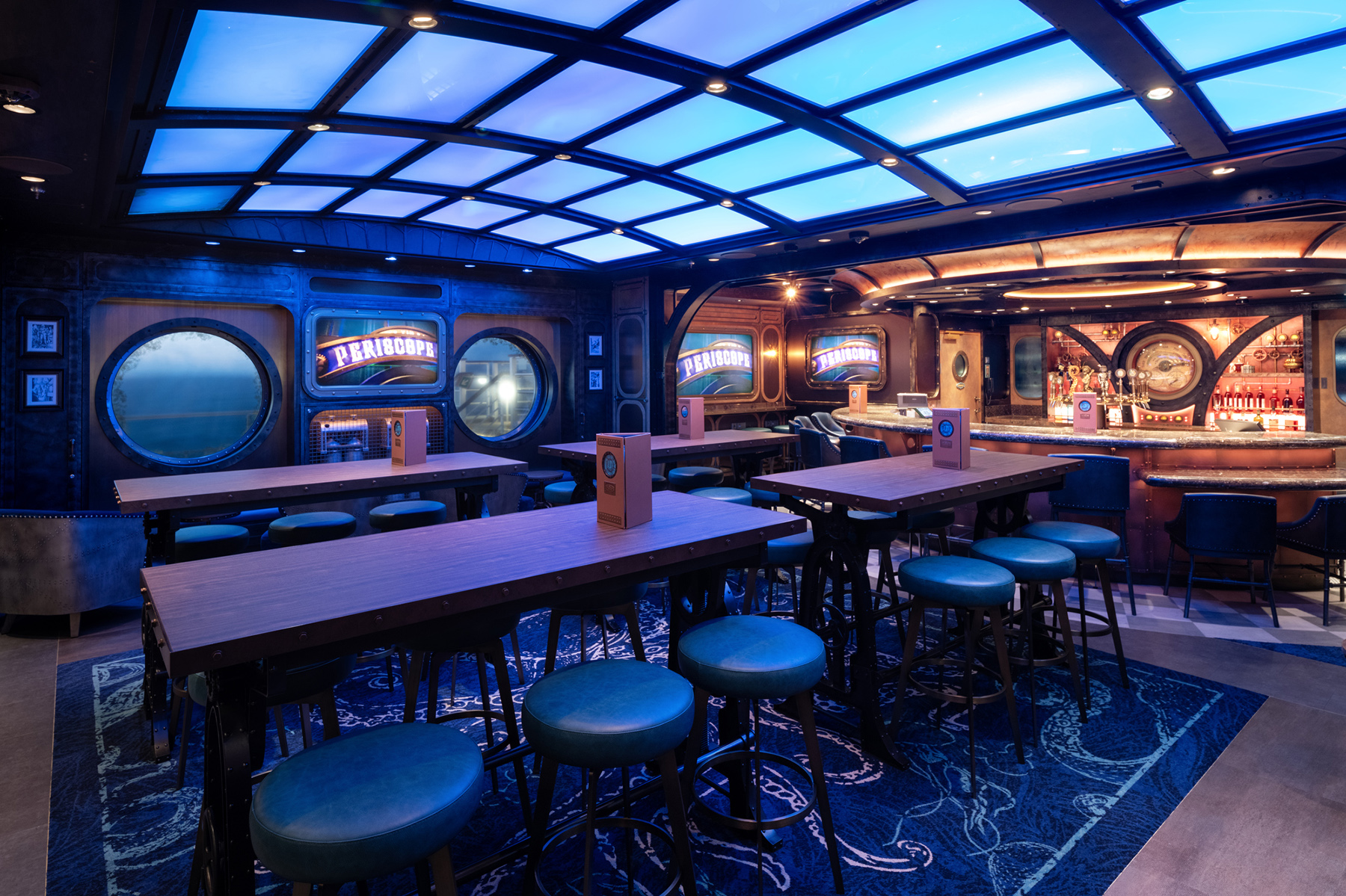 Los viajeros se podrán sumergir en las profundidades míticas de océanos inexplorados en el Periscope Pub. Sirviendo como el primer lugar de Disney Cruise Line inspirado en la fascinante aventura de la película de Walt Disney de 1954, “20,000 leguas de viaje submarino” y la atracción heredada de los Parques de Disney, los interiores de estilo submarino brindan a los visitantes una mirada al mundo acuático que se encuentra debajo a través de un techo de cristal intrigante.
