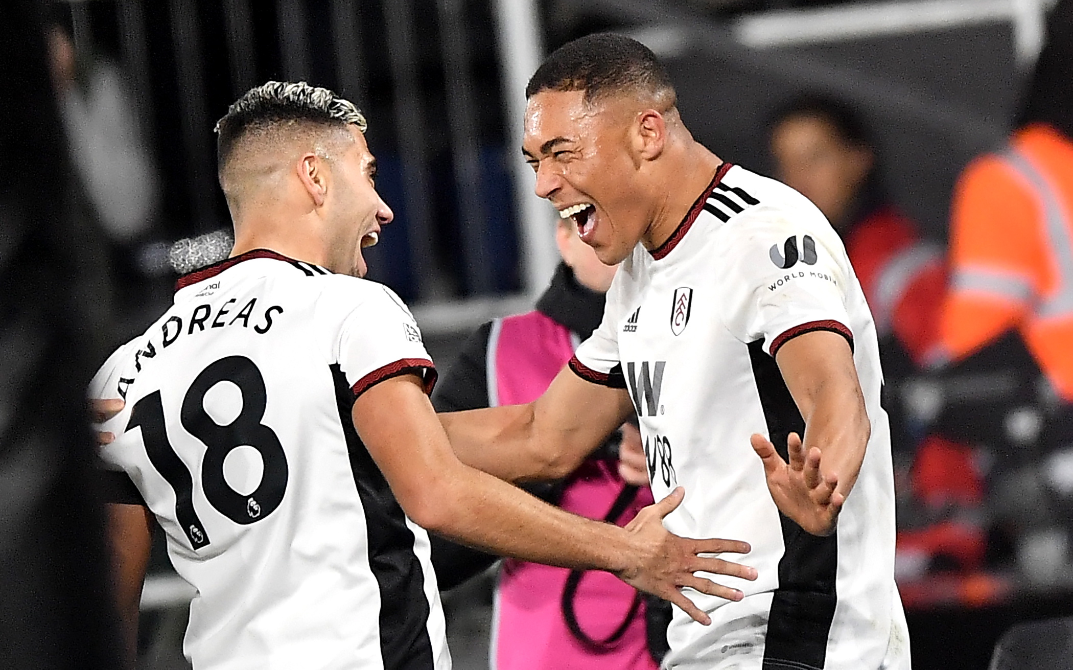 London (United Kingdom), 12/01/2023.- Carlos Vinicius (L) of Fulham celebrates with teammate Andreas Pereira after scoring his team's second goal with a header during the English Premier League soccer match between Fulham FC and Chelsea FC in London, Britain, 12 January 2023. (Reino Unido, Londres) EFE/EPA/Vince Mignott EDITORIAL USE ONLY. No use with unauthorized audio, video, data, fixture lists, club/league logos or 'live' services. Online in-match use limited to 120 images, no video emulation. No use in betting, games or single club/league/player publications