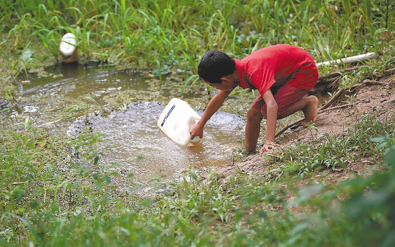 En Nuevo Horizonte usan el agua de los pozos para bañarse, lavar y cocinar. / Mauricio Alvarado