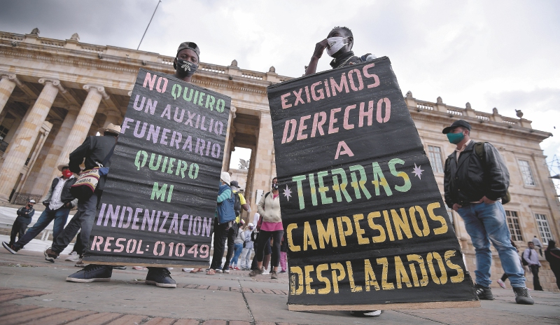 Desplazamiento forzado predomina como delito del conflicto en Colombia: Informe