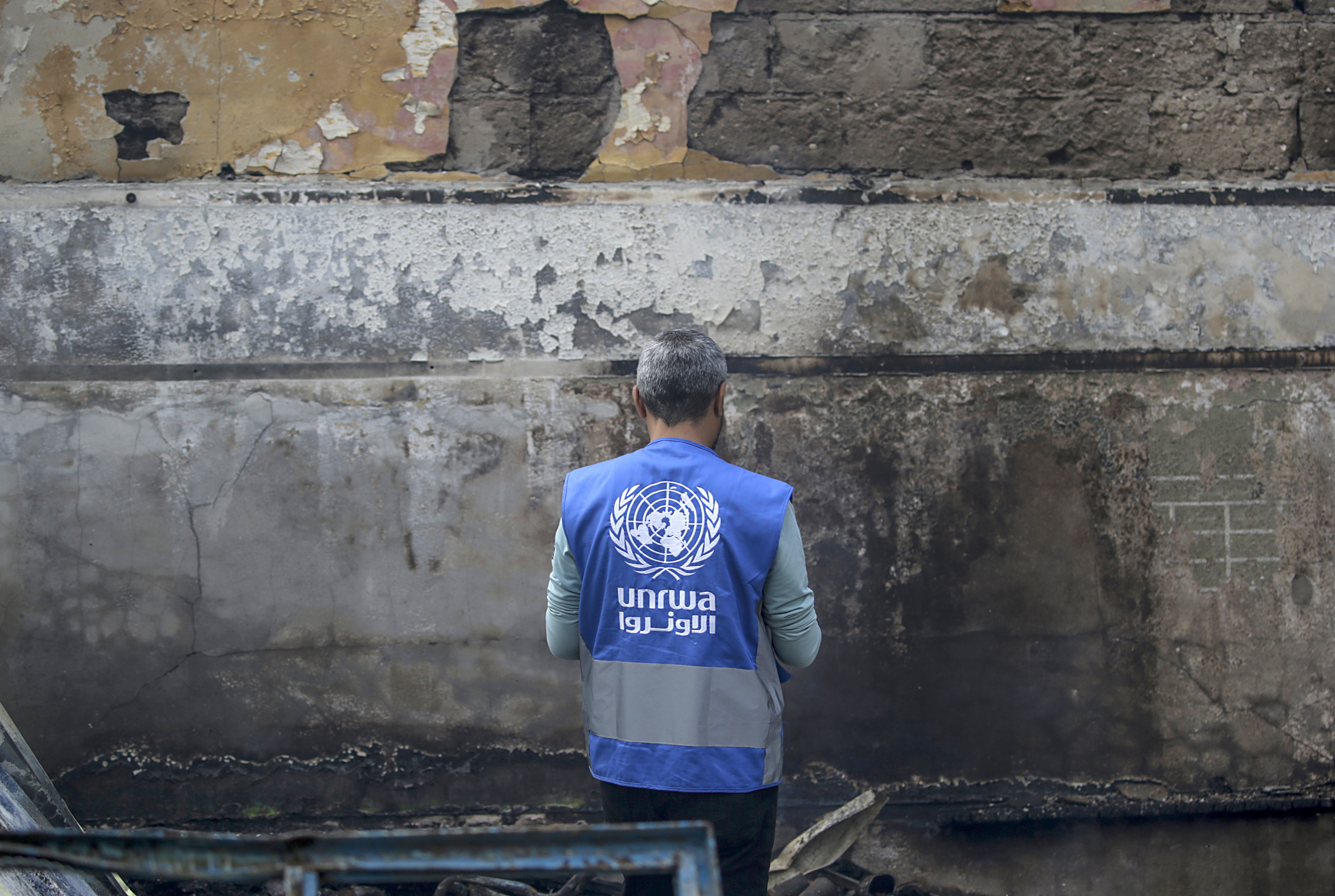 Al Nuseirat Camp (-), 14/05/2024.- Unrwa employee inspects a destroyed United Nations school following an air strike in Al Nuseirat refugee camp, central Gaza Strip, 14 May 2024. At least six people were killed in the strike which hit the UNRWA (United Nationas Relief and Works Agency for Palestinians in the near east) school, according to the Palestinian Civil Defense in Gaza. More than 35,000 Palestinians and over 1,455 Israelis have been killed, according to the Palestinian Health Ministry and the Israel Defense Forces (IDF), since Hamas militants launched an attack against Israel from the Gaza Strip on 07 October 2023, and the Israeli operations in Gaza and the West Bank which followed it. EFE/EPA/MOHAMMED SABER