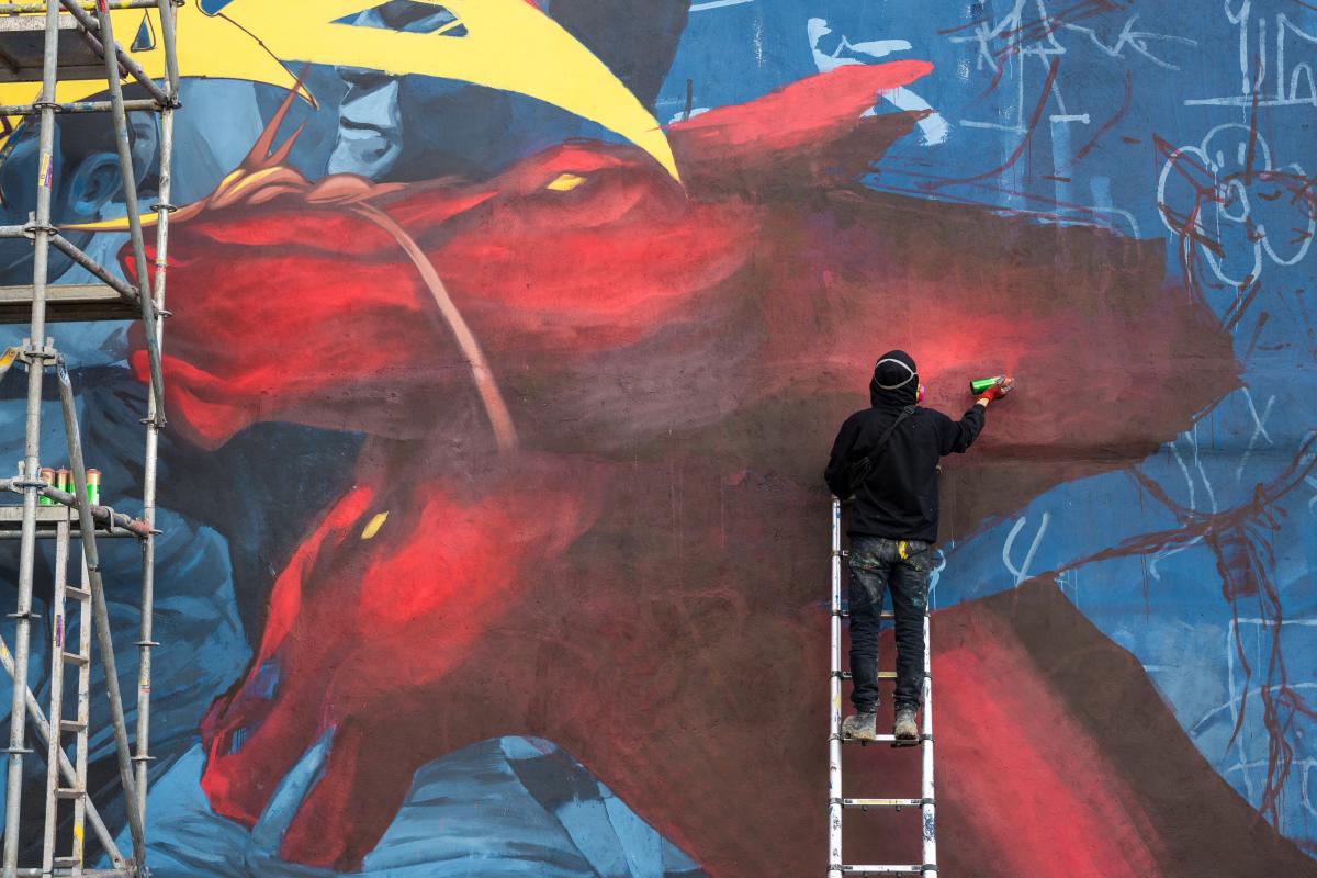 Este grafiti es un homenaje al Rock al Parque 2023 que rindió el colectivo Planeta Sur en la av. Caracas con calle 63.