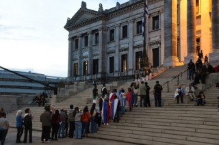 People queue outside of the Palacio Legislativo to pay last respects to Uruguay's former President Jose 'Pepe' Mujica, in Montevideo, on May 14, 2025, a day after his death.