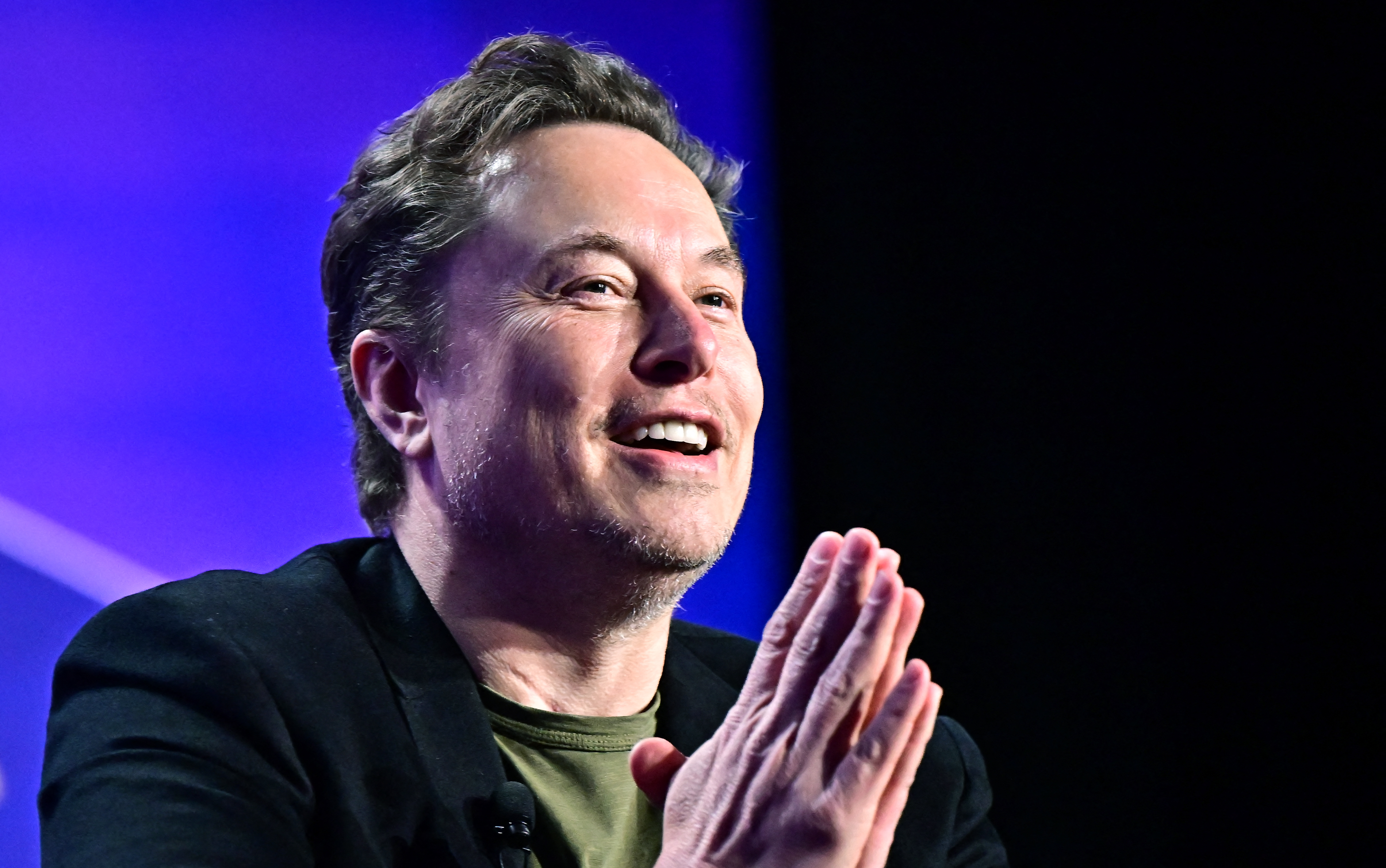 (FILES) Tesla CEO Elon Musk speaks at the 27th annual Milken Institute Global Conference at the Beverly Hilton in Los Angeles on May 6, 2024.