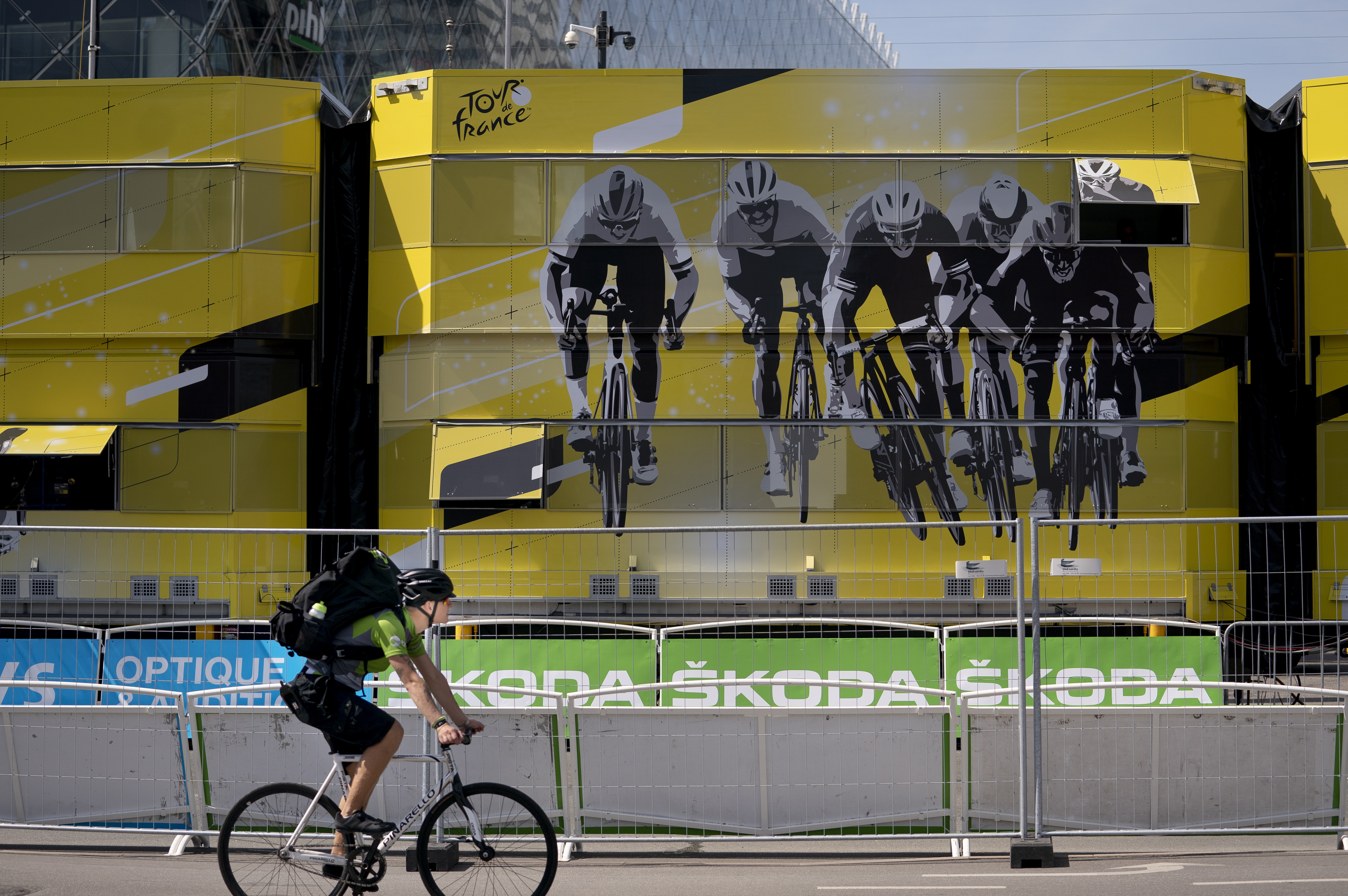 Copenhagen (Denmark), 29/06/2022.- A person cycles past the finish area a day before the Tour de France 2022 starts in Copenhagen, Denmark, 30 June 2022. The Tour de France 2022 starts on 01 July and the first three stages will be held in Denmark before the race is going to France. (Ciclismo, Dinamarca, Francia, Copenhague) EFE/EPA/Liselotte Sabroe DENMARK OUT