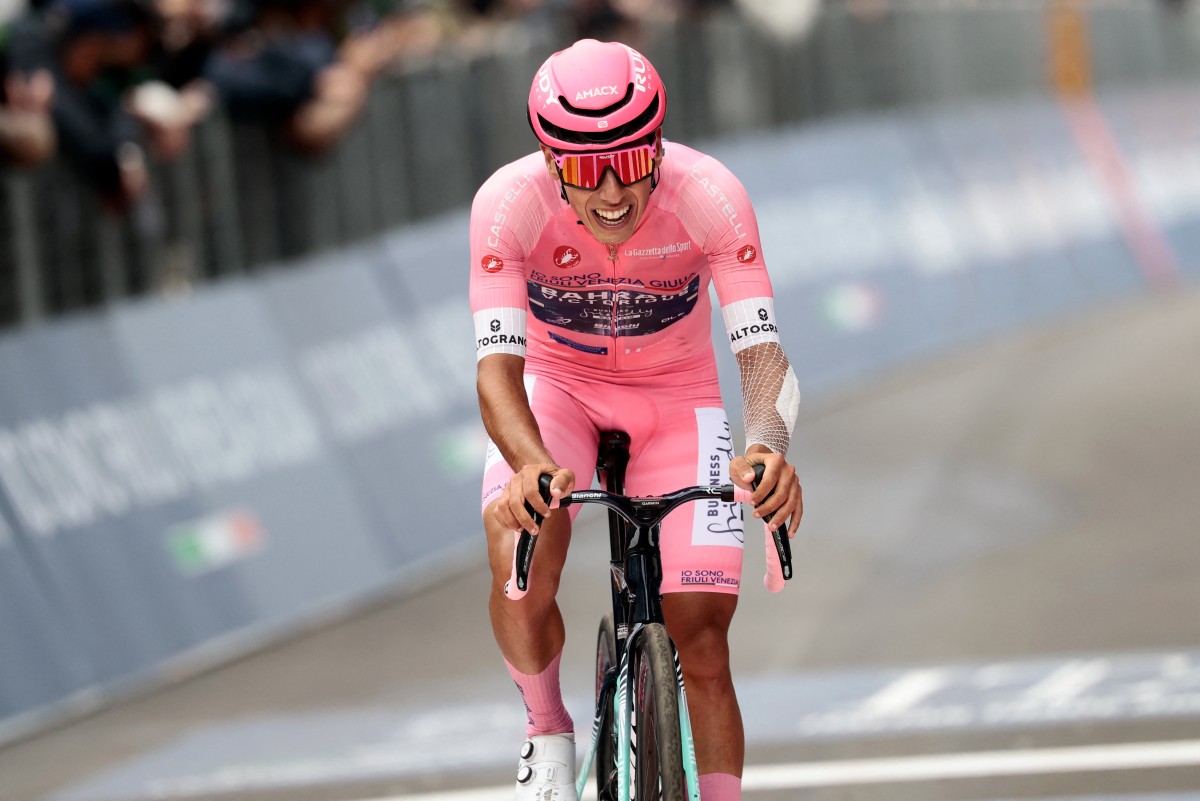 Bahrain - Victorious Portuguese rider Afonso Eulalio, wearing the overall leader's pink jersey (Maglia Rosa), crosses the finish line at the end of the 9th stage of the Giro d'Italia 2026 - Tour of Italy cycling race between Cervia and Corno alle Scale, near Doganaccia, central Italy on May 17, 2026.