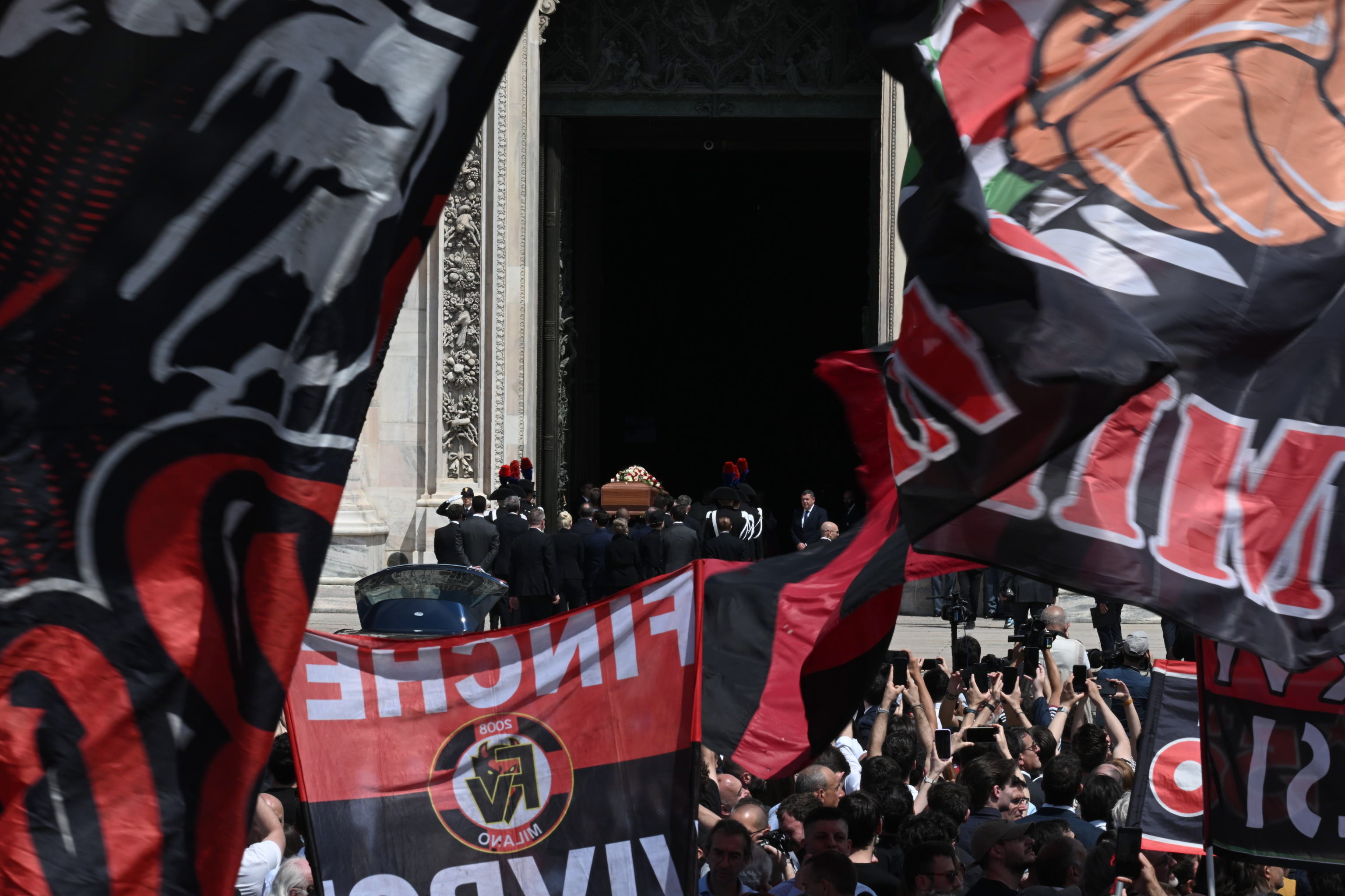 Milan (Italy), 14/06/2023.- 'Curva Sud', the supporters of AC Milan soccer club are gathere for the state funeral for Italy's former prime minister and media mogul Silvio Berlusconi, in Milan, Italy, 14 June 2023. Silvio Berlusconi died at the age of 86 on 12 June 2023 at Milan's San Raffaele hospital. The Italian media tycoon and Forza Italia (FI) party founder, dubbed as 'Il Cavaliere' (The Knight), served as prime minister of Italy in four governments. The Italian government has declared 14 June 2023 a national day of mourning. (Italia) EFE/EPA/CIRO FUSCO