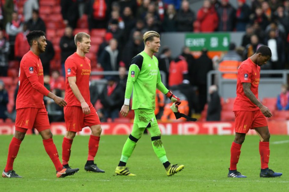 Los jugadores de Liverpool, tras quedar eliminados el sábado anterior de la FA Cup frente al Wolverhampton. / AFP