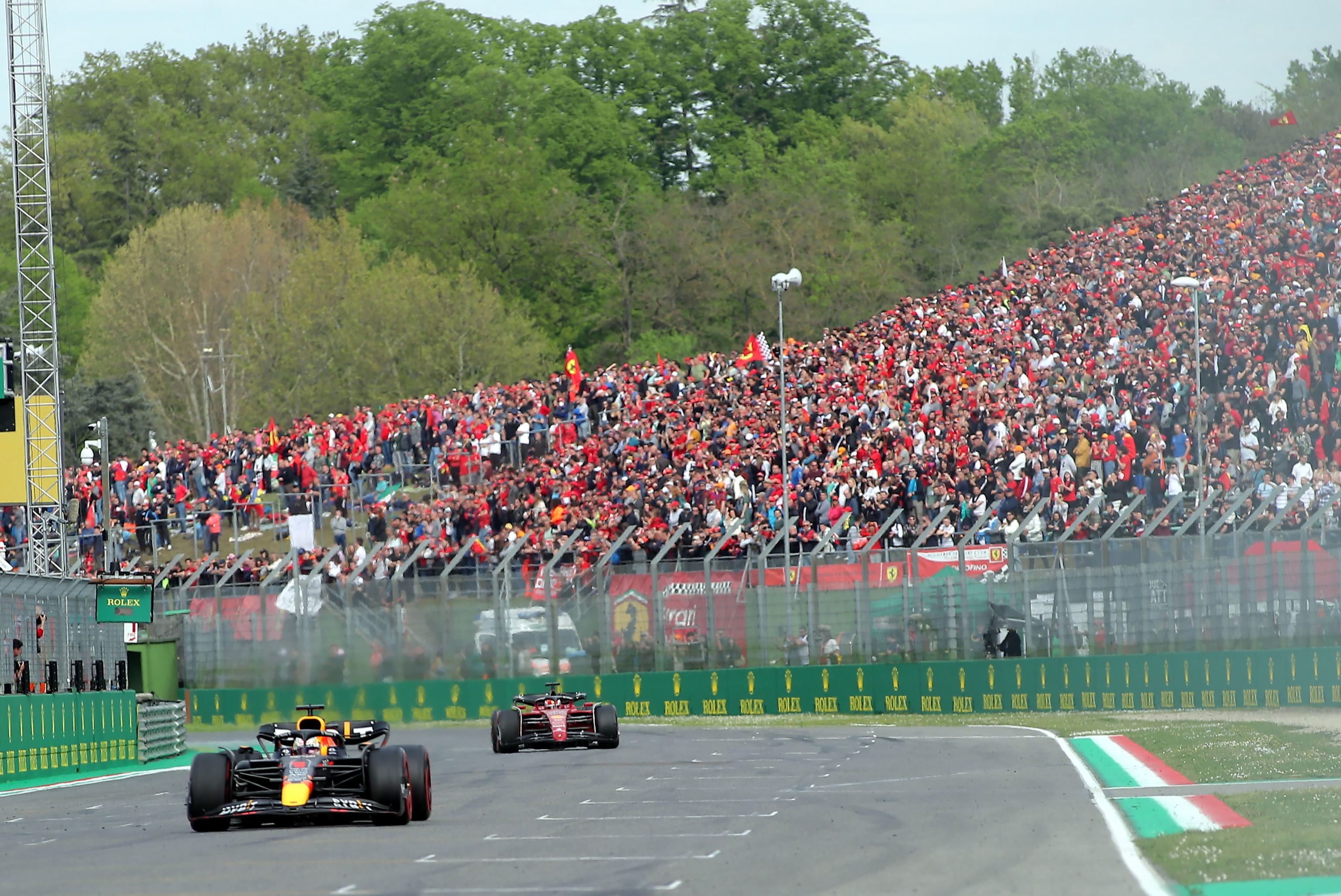 Imola (Italy), 23/04/2022.- Red Bull Racing's Dutch driver Max Verstappen (L) and Ferrari's Monegasque driver Charles Leclerc in action during the sprint qualifying of the Formula One Grand Prix of Emilia Romagna at the Autodromo Internazionale Enzo e Dino Ferrari race track in Imola, Italy, 23 April 2022. The Formula One Grand Prix of Emilia Romagna will take place on 24 April 2022. (Fórmula Uno, Italia) EFE/EPA/SANNA