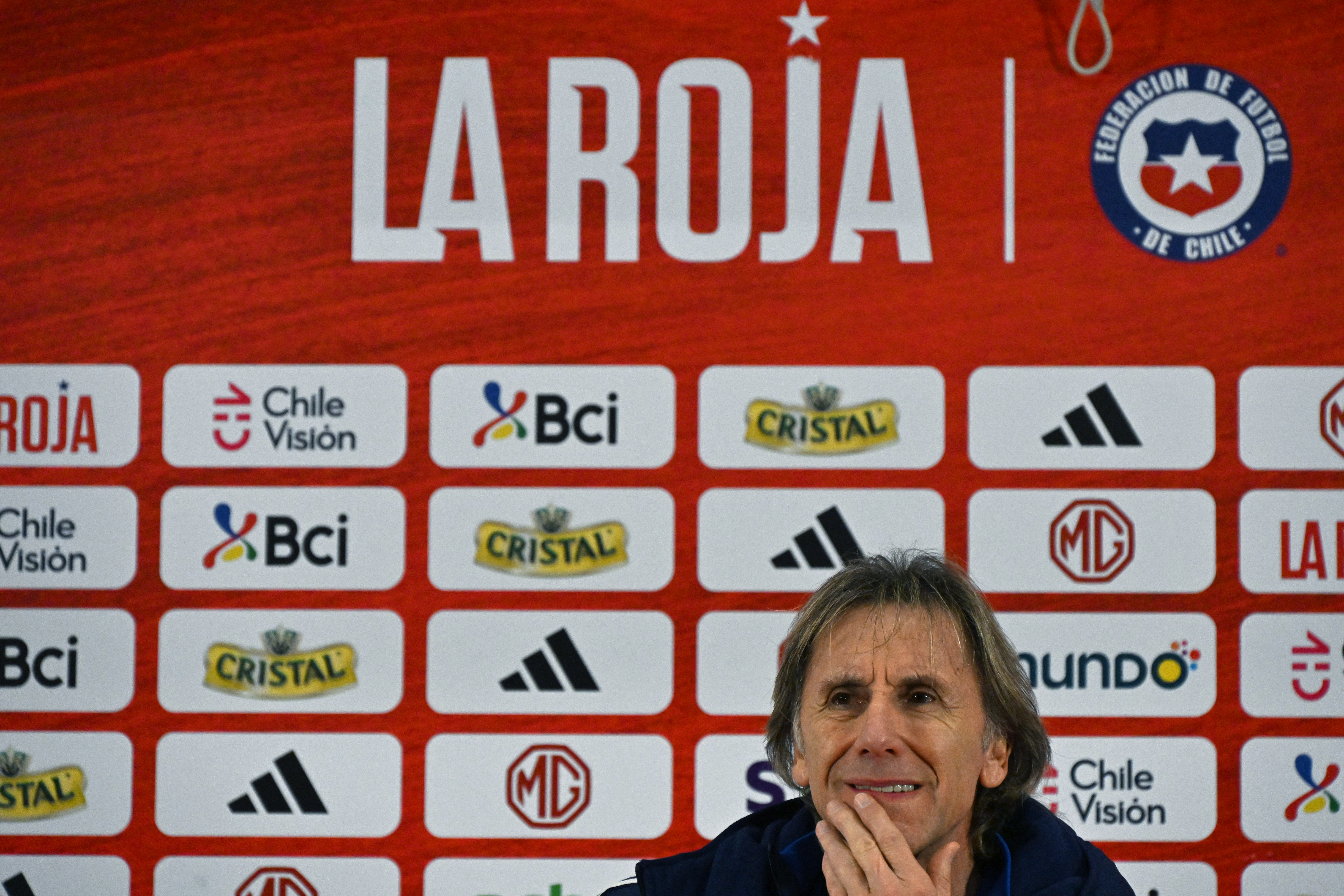 Chile's Argentine coach Ricardo Gareca gestures during a press conference to announce the list of players called up for the friendly match against Paraguay on June 11, at the Juan Pinto Duran Sports Complex in Santiago on May 24, 2024. (Photo by RODRIGO ARANGUA / AFP)