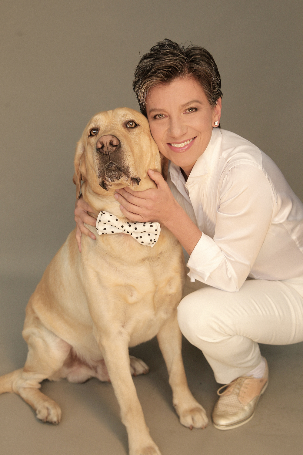 Lucky, su perro labrador, es el otro gran amor de Claudia.