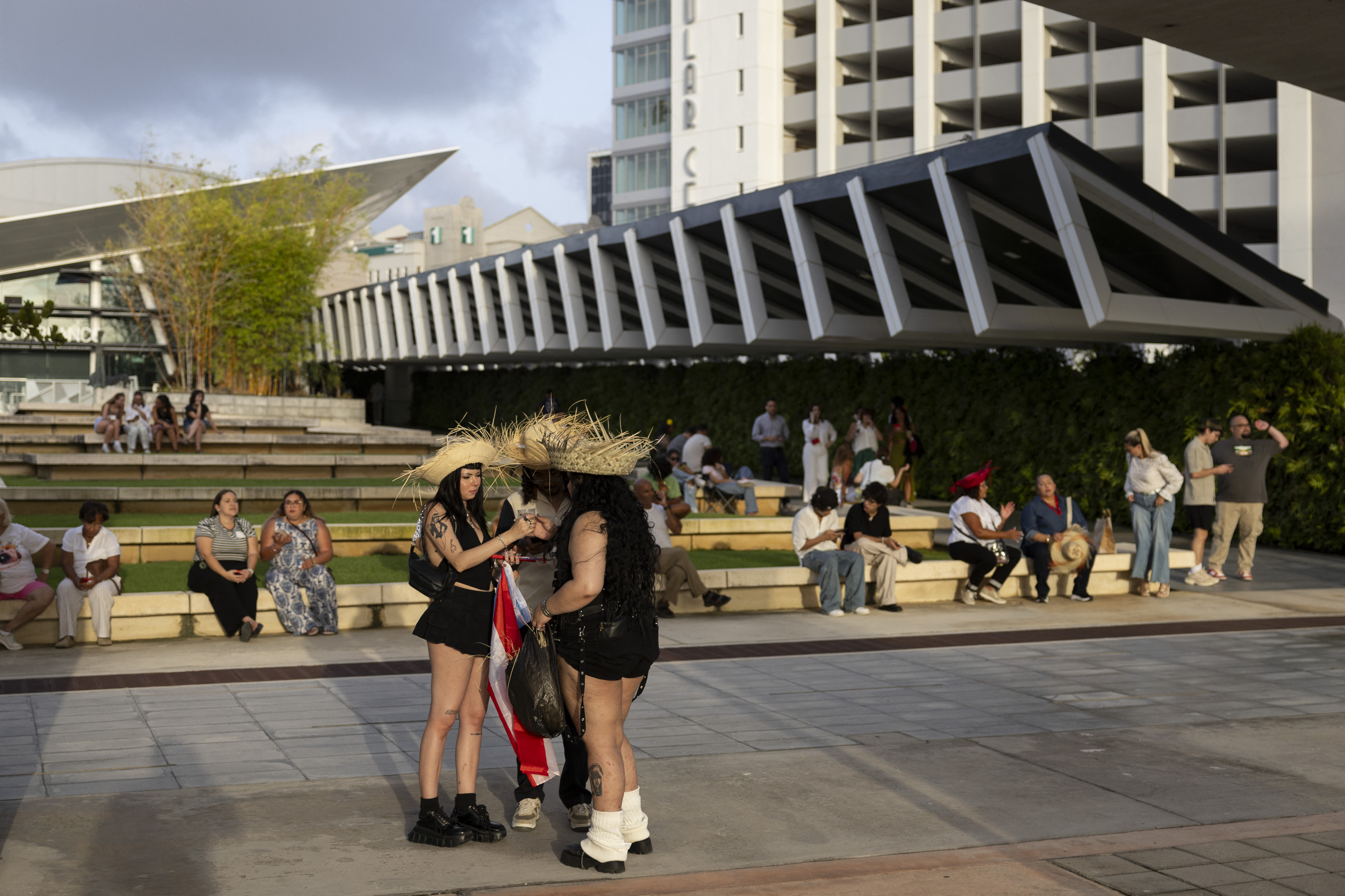 People queue to attend the first show of Puerto Rican singer Bad Bunny's 30-date concert residency at the Coliseo de Puerto Rico in San Juan, Puerto Rico, on July 11, 2025.