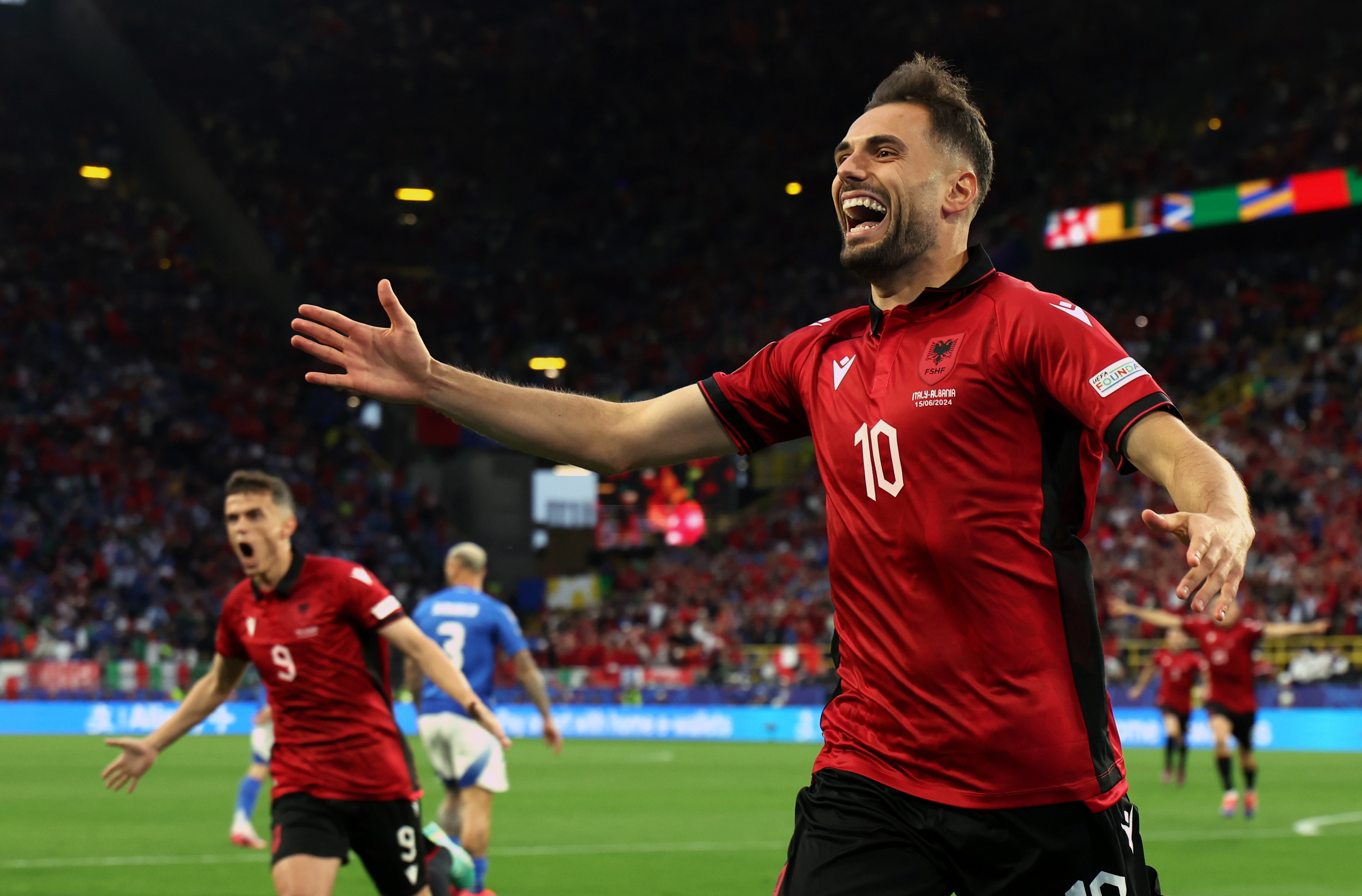 Dortmund (Germany), 15/06/2024.- Nedim Bajrami of Albania celebrates scoring the 1-0 during the UEFA EURO 2024 group B soccer match between Italy and Albania, in Dortmund, Germany, 15 June 2024. (Alemania, Italia) EFE/EPA/FRIEDEMANN VOGEL