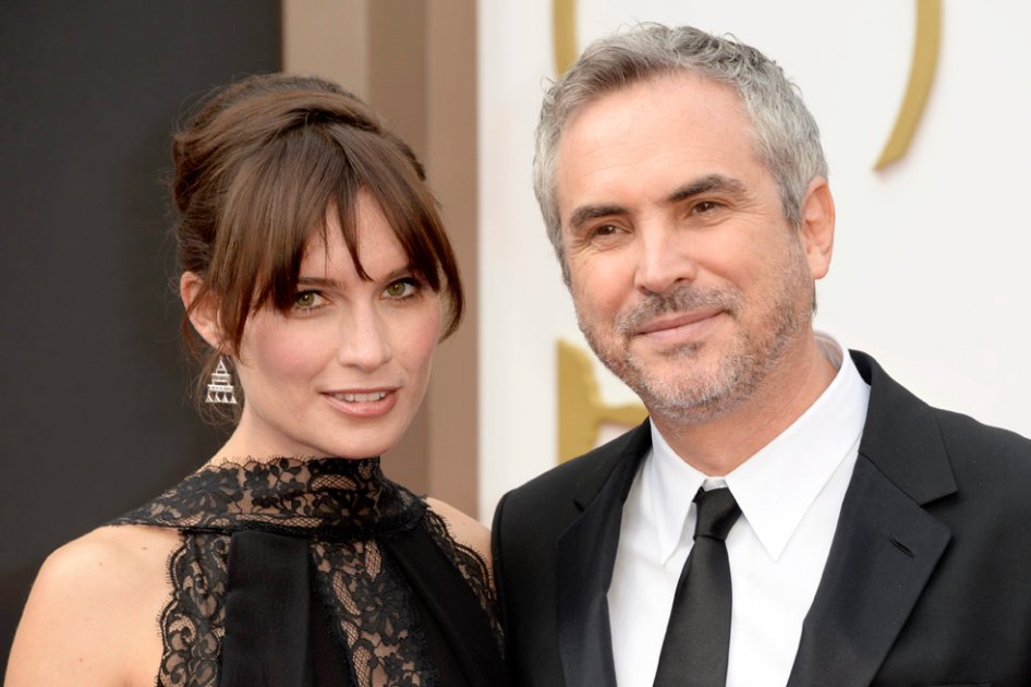 Sheherazade Goldsmith y Alfonso Cuarón en los premios Óscar 2014.