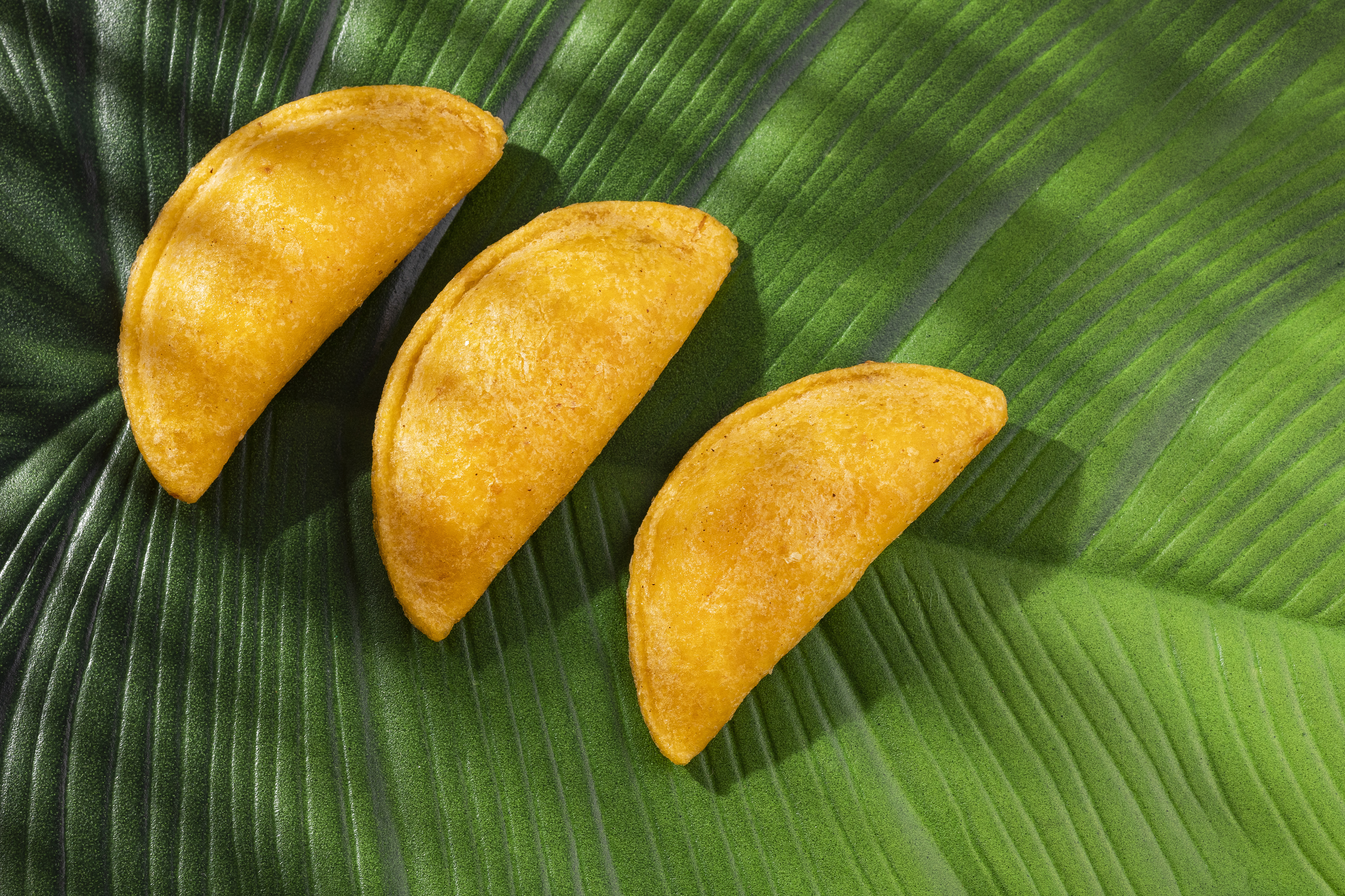 Masa crocante para empanadas de maíz trillado amarillo con ají de lulo