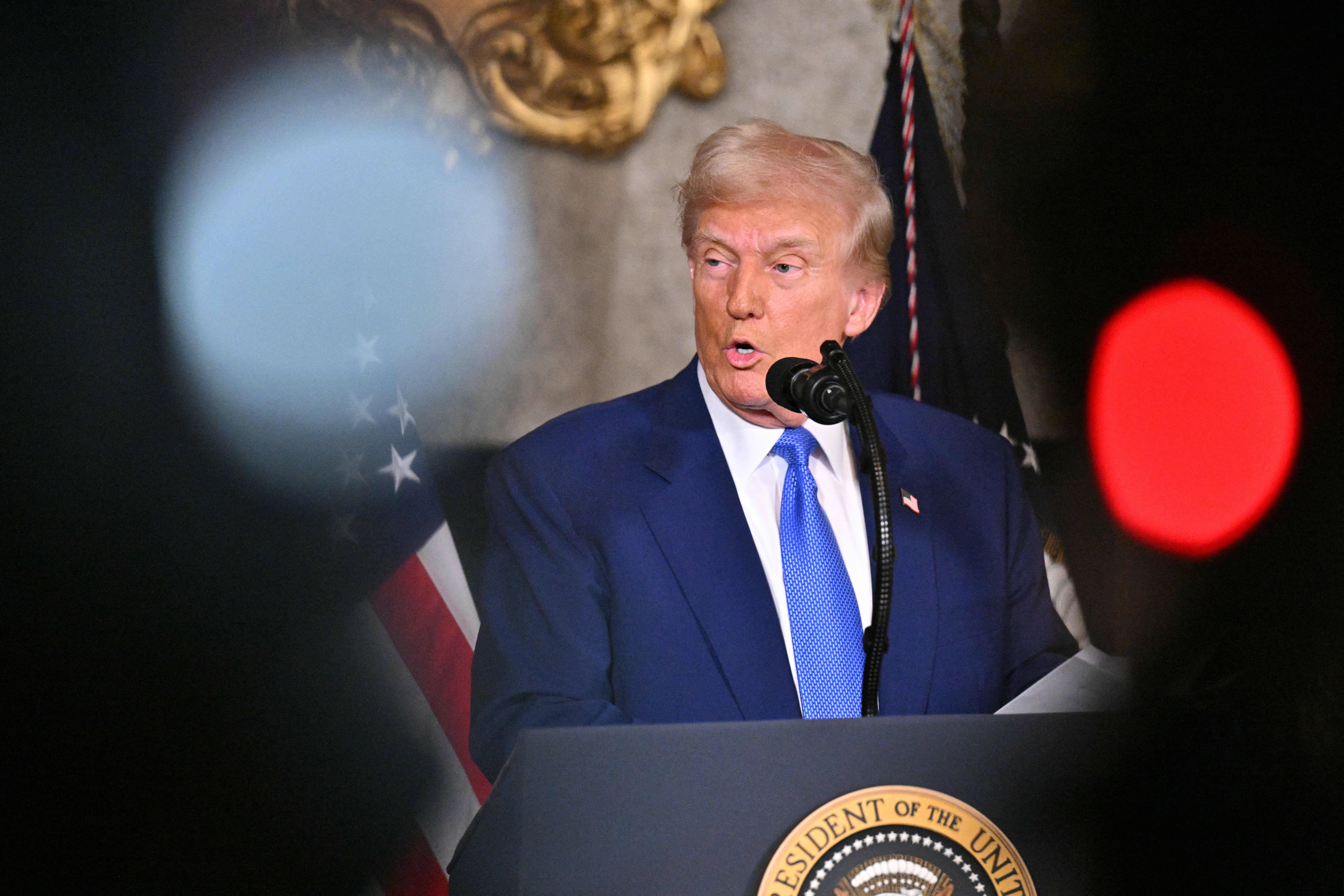 US President Donald Trump takes a question as he speaks during the signing of executive orders at his Mar-a-Lago resort in Palm Beach, Florida, on February 18, 2025.
