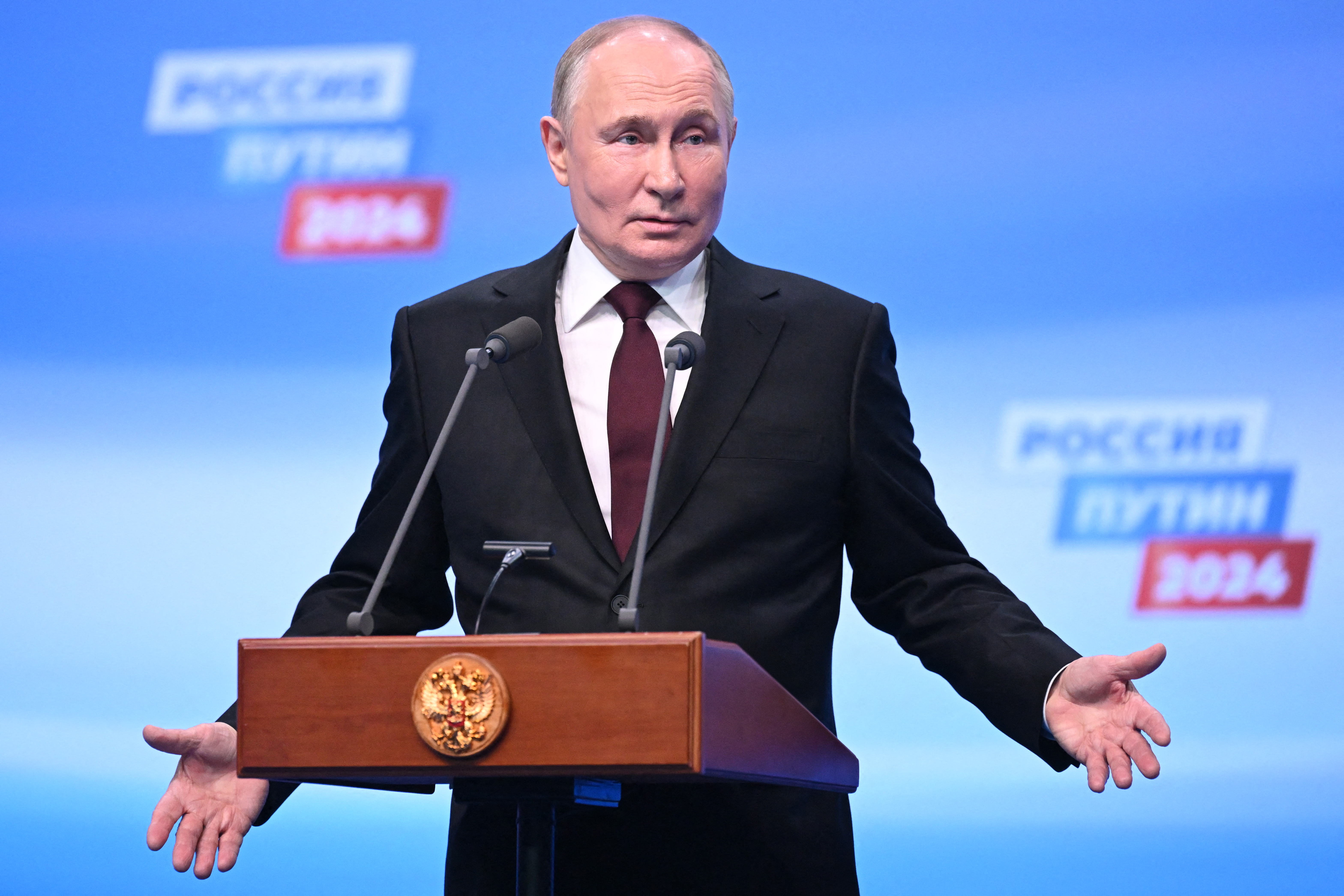 Russian President and presidential candidate Vladimir Putin meets with the media at his campaign headquarters in Moscow on March 18, 2024. (Photo by NATALIA KOLESNIKOVA / POOL / AFP)