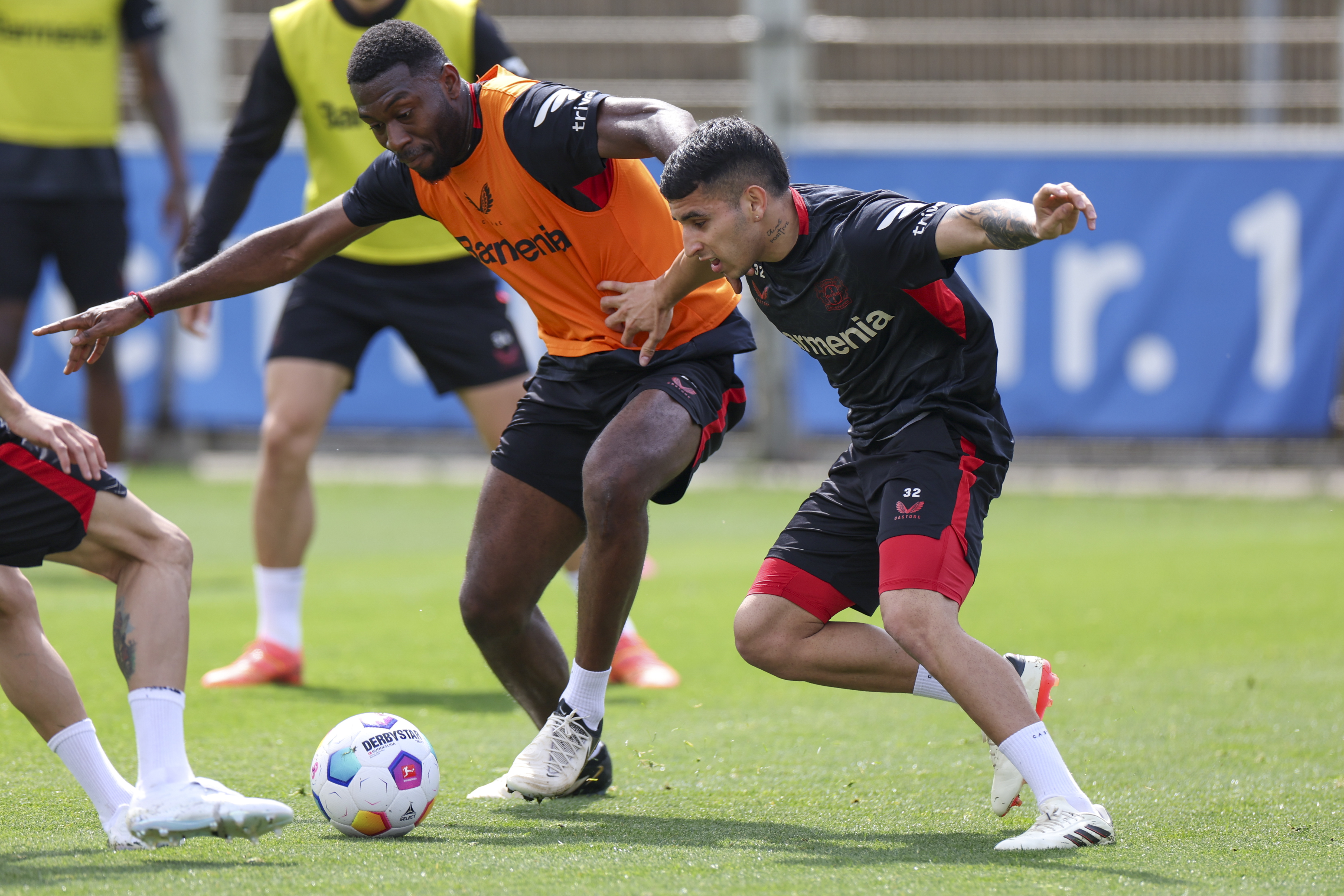 Leverkusen (Germany), 15/05/2024.- Victor Boniface (L) and Gustavo Puerta of Bayer Leverkusen in action during the training session of the team on the UEFA Open Media Day in Leverkusen, Germany, 15 May 2024. Bayer Leverkusen will face Atalanta in the UEFA Europa League final on 22 May 2024. (Alemania) EFE/EPA/CHRISTOPHER NEUNDORF