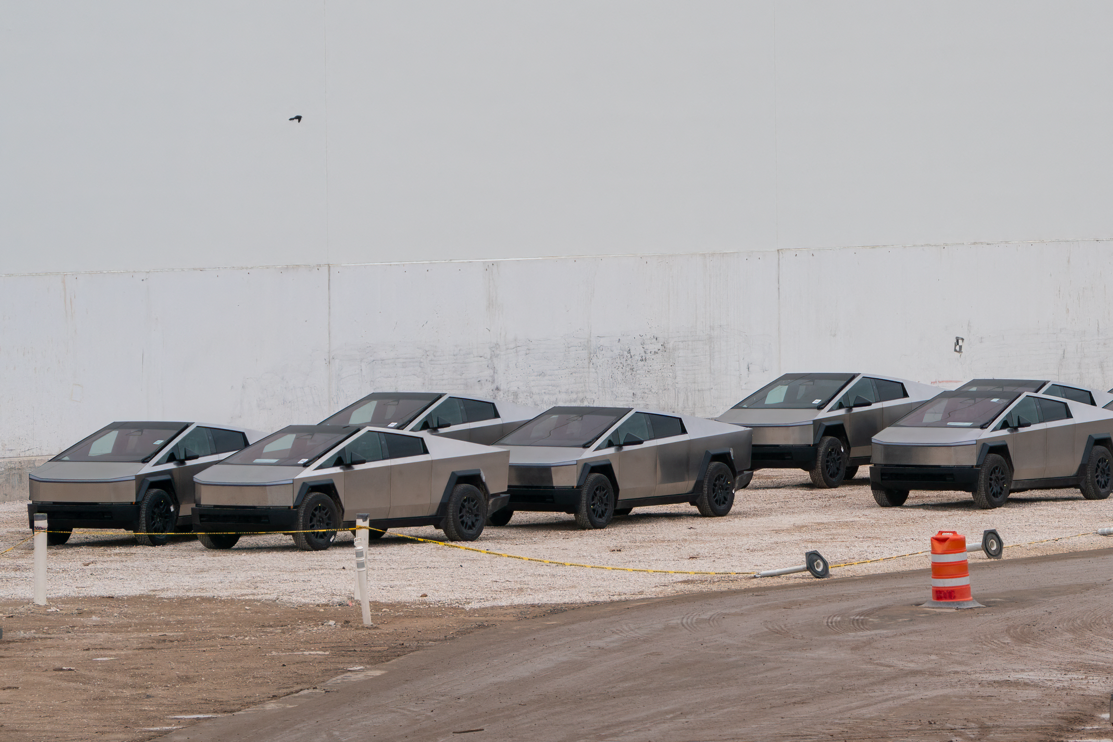 (FILES) Newly manufactured Tesla Cybertrucks are parked outside the company's Giga Texas factory on December 13, 2023, in Austin, Texas.