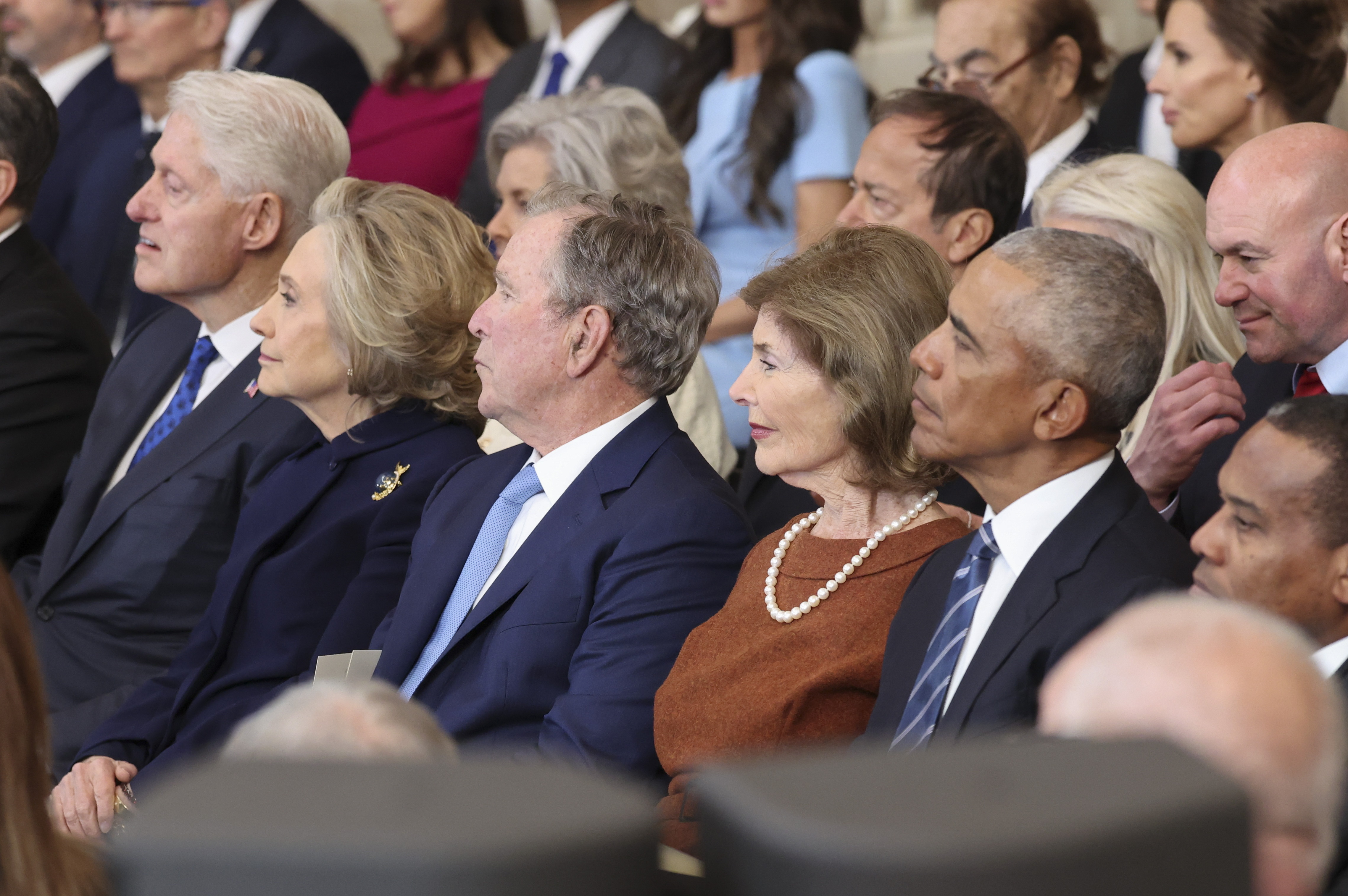 Washington (United States), 20/01/2025.- Former U.S. President Barack Obama, Former U.S. President Bill Clinton, former Secretary of State Hillary Clinton, former U.S. President George W Bush, and Laura Bush look on ahead of the inauguration ceremony of Donald Trump is sworn in as the 47th US President in the US Capitol Rotunda in Washington, DC, USA, 20 January 2025. EFE/EPA/KEVIN LAMARQUE / POOL