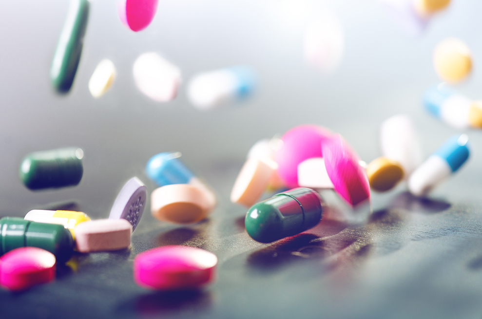 Levitation of pills on a black background